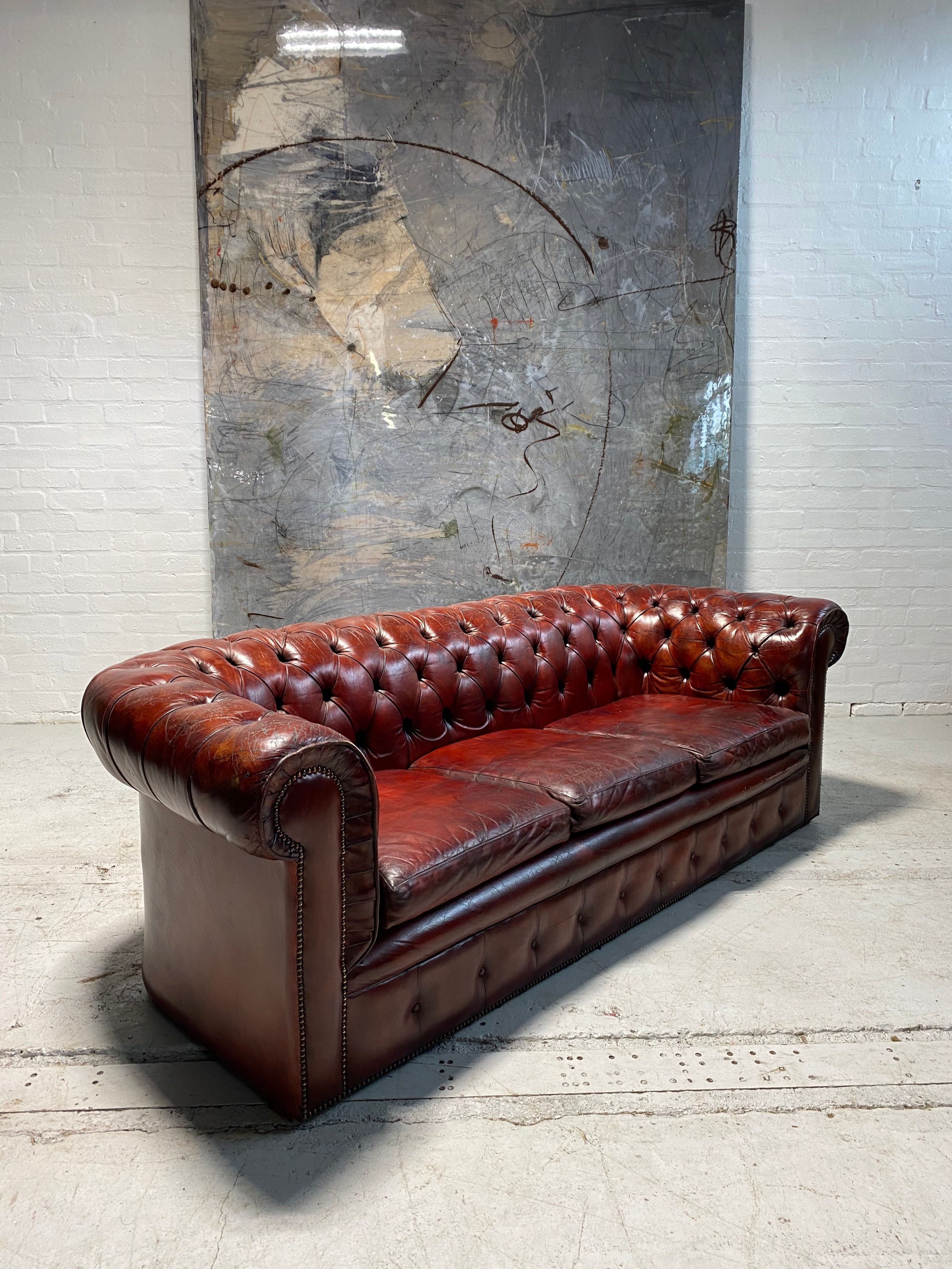 A Stunning MidC Vintage Chesterfield Sofa