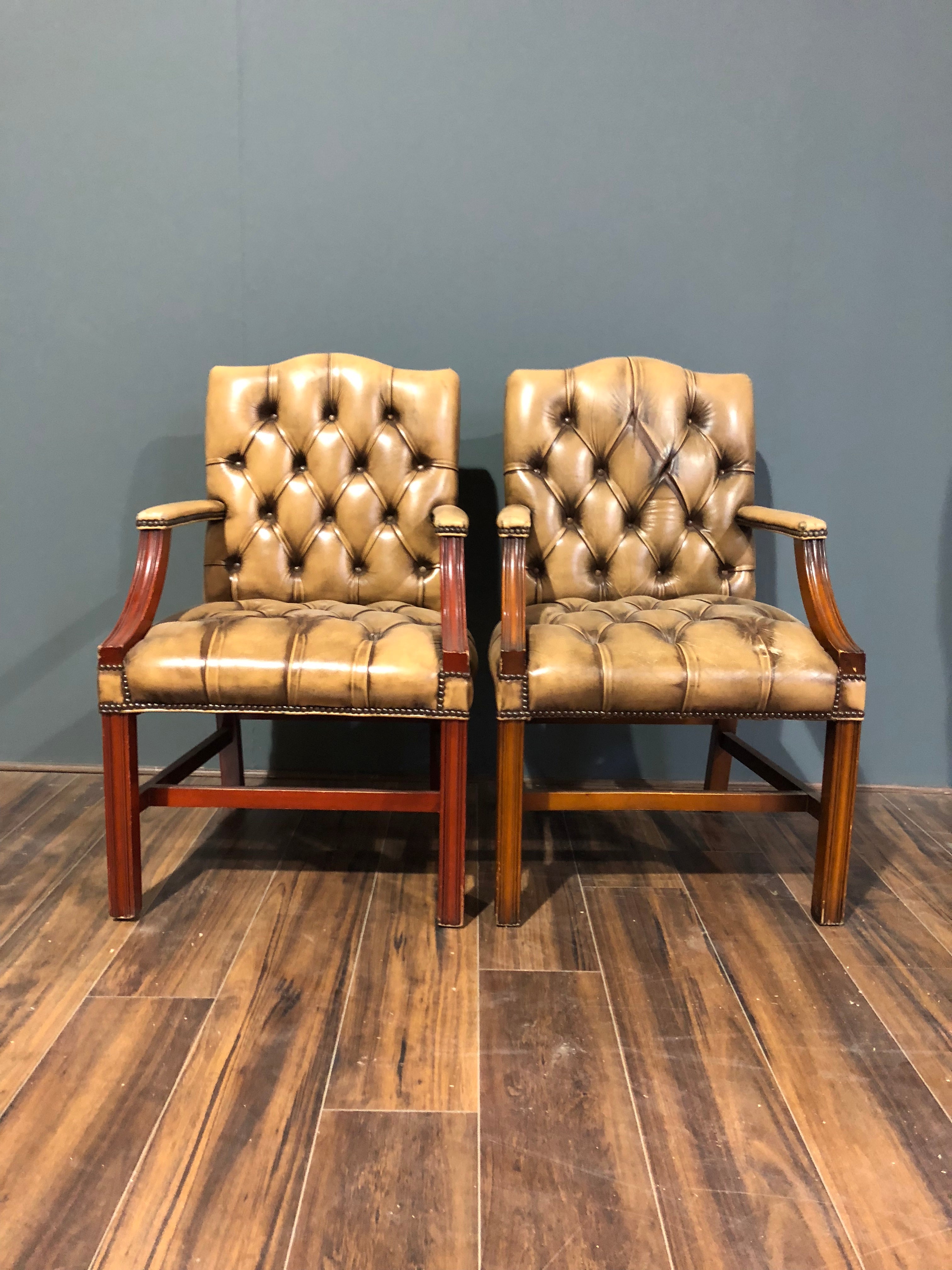 A Charming Pair of Side Chairs in Rustic Tan Leathers