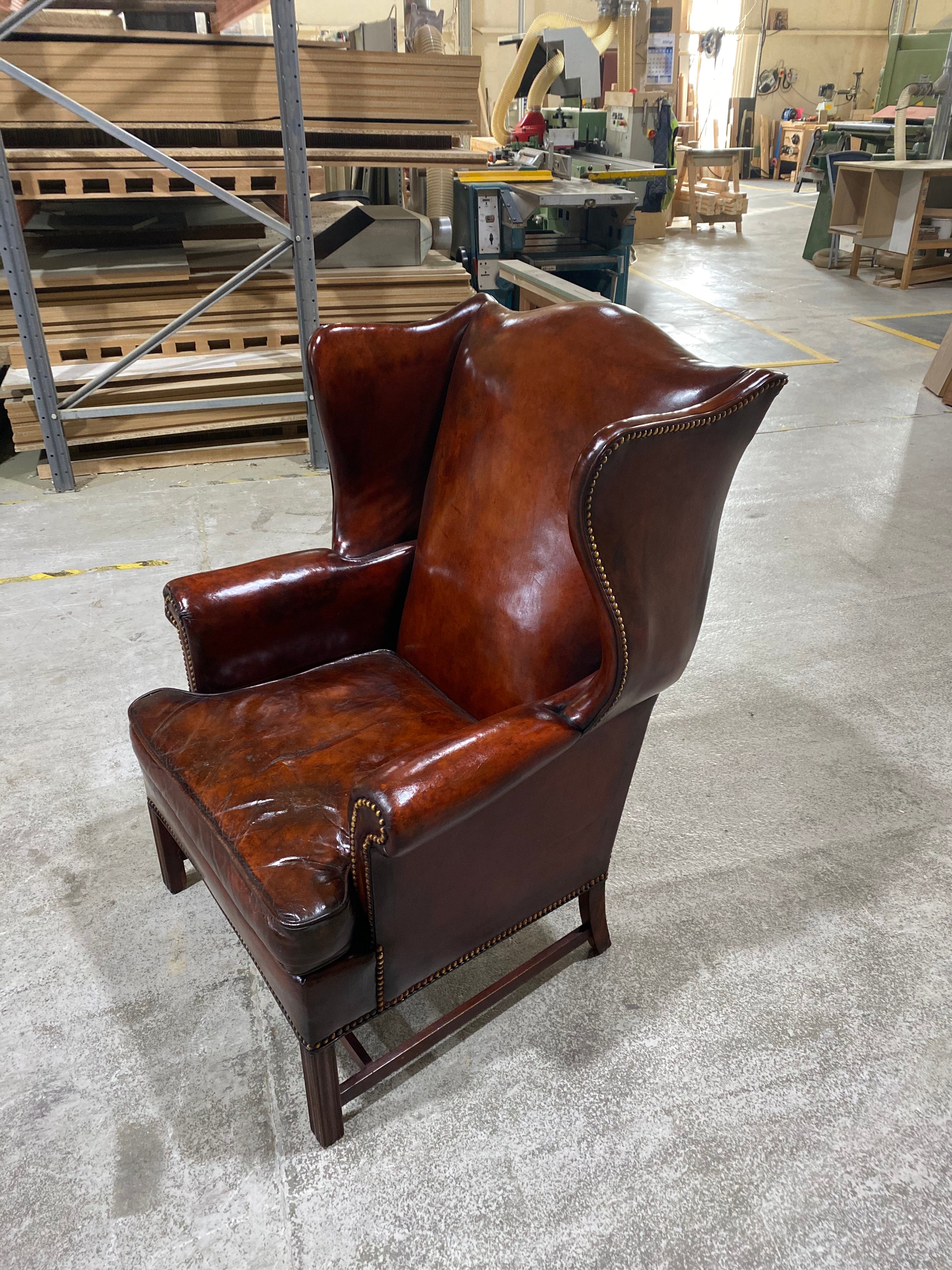 A Beautiful Early 20thC Gentleman’s Wing chair in Horse Chestnut