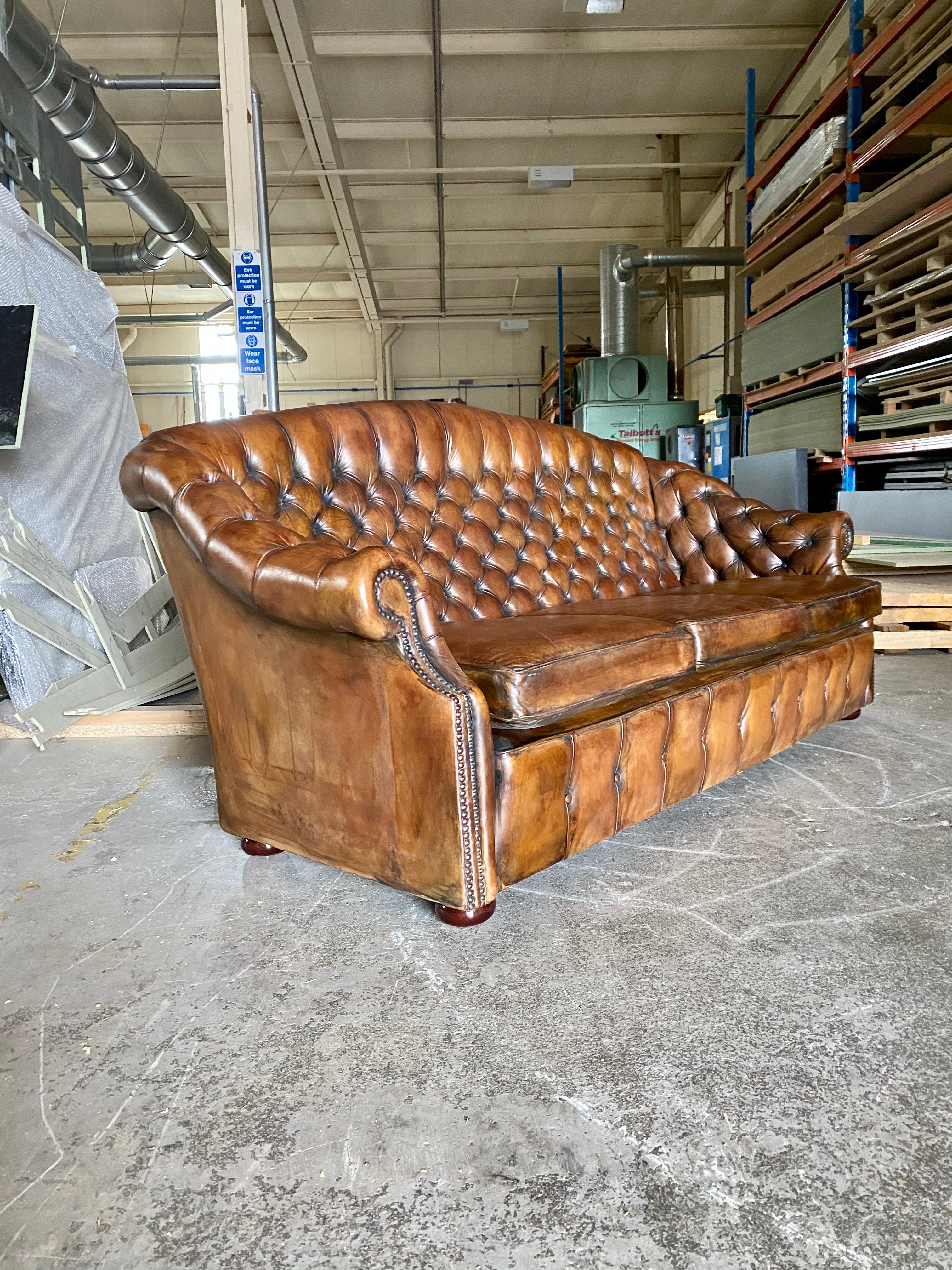 A Beautiful Arch Backed Chesterfield suite in Hand Dyed Leathers