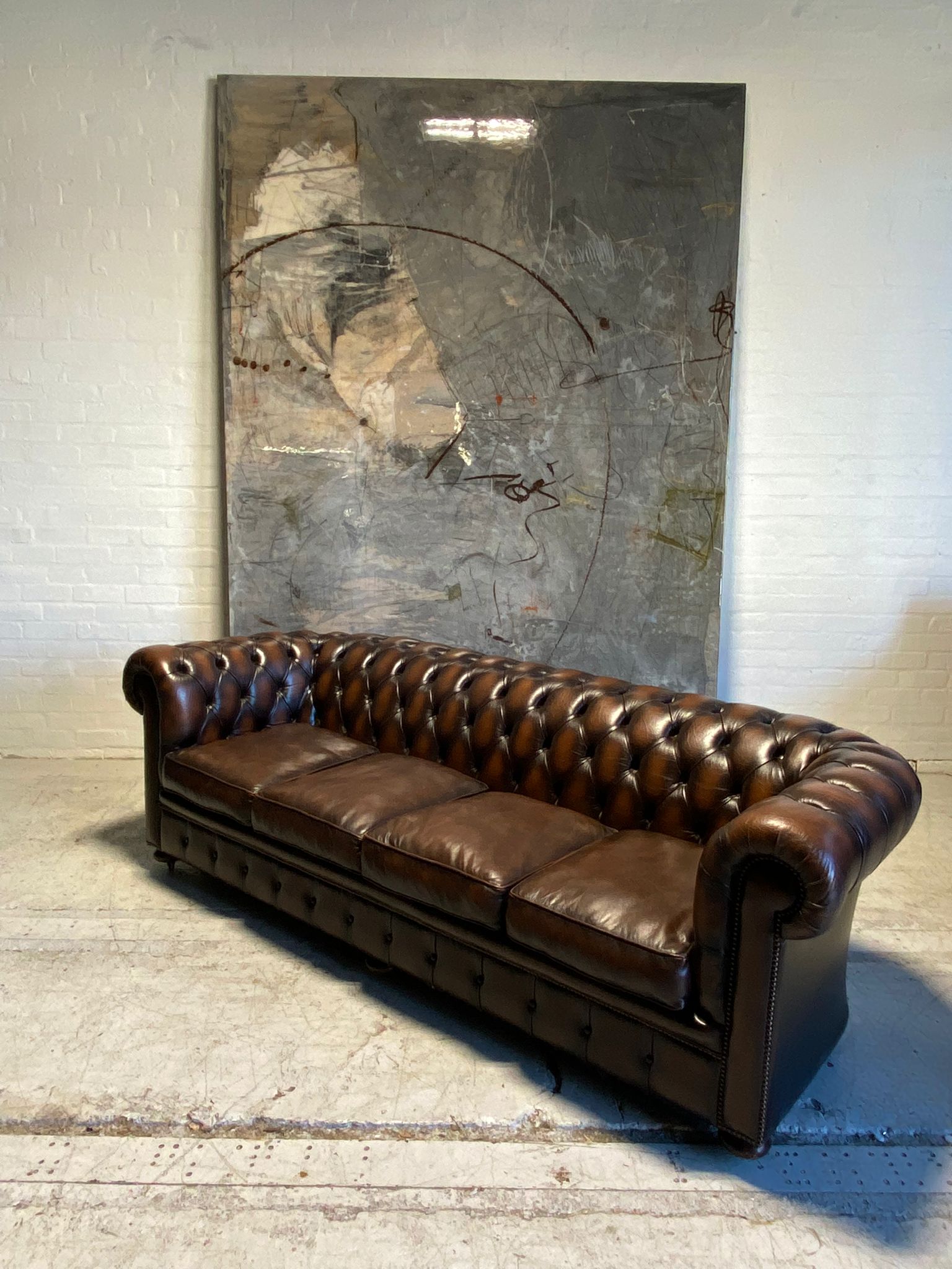 An Excellent 4 Seater Leather Chesterfield Sofa