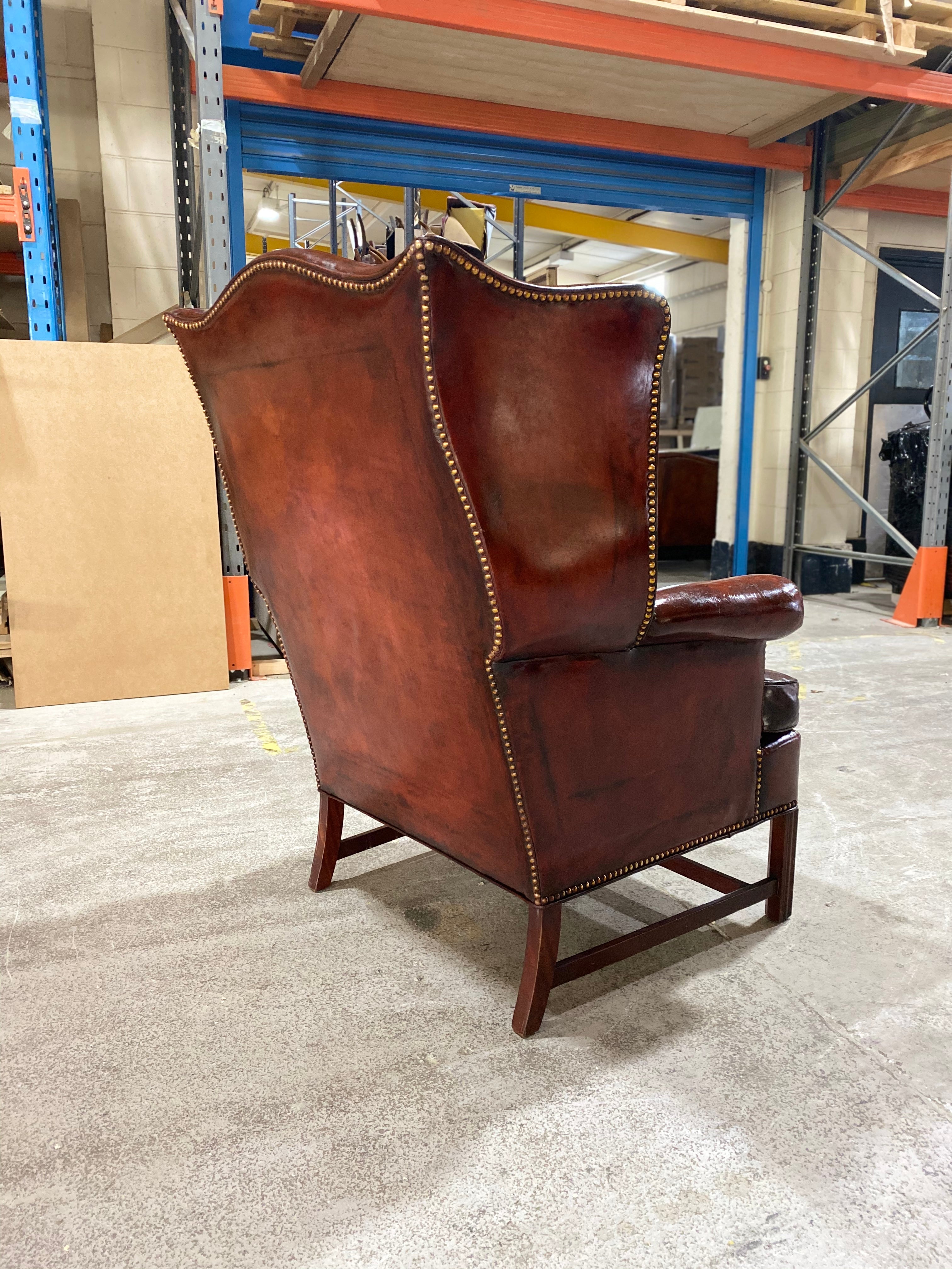 A Beautiful Early 20thC Gentleman’s Wing chair in Horse Chestnut