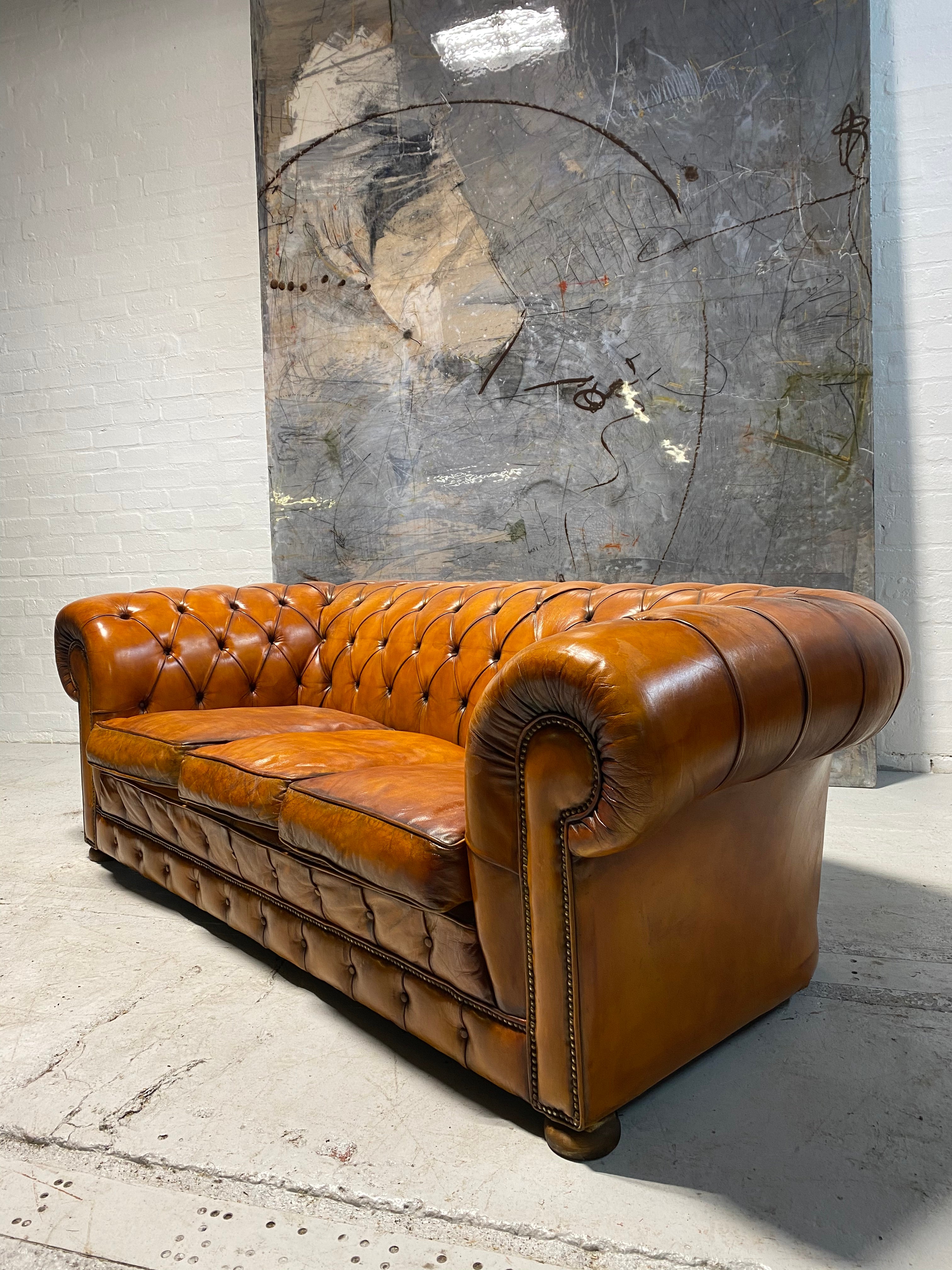 A Sumptuous Chesterfield in Hand Dyes Honey Tan Leathers