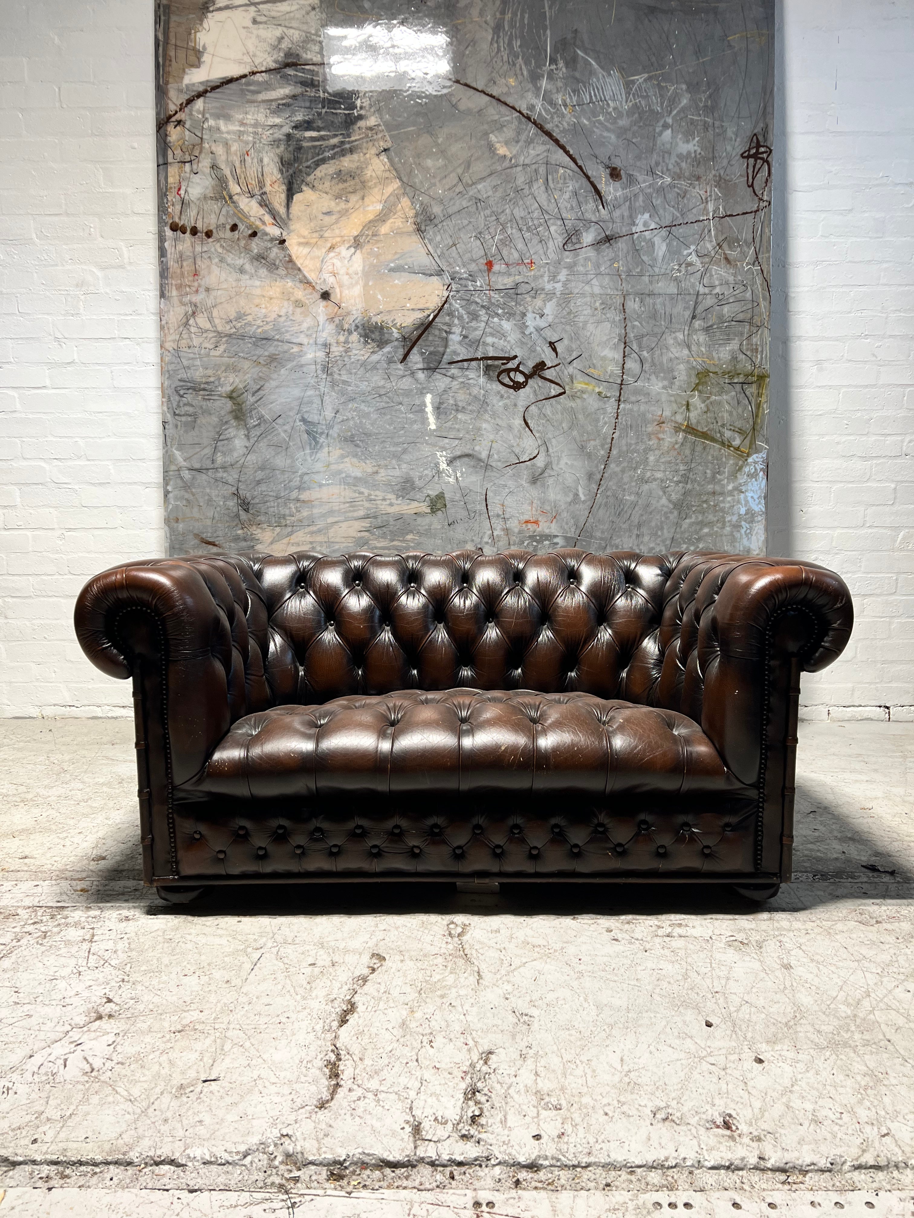 A Lovely Little Brown Leather Chesterfield 2 Seat Sofa