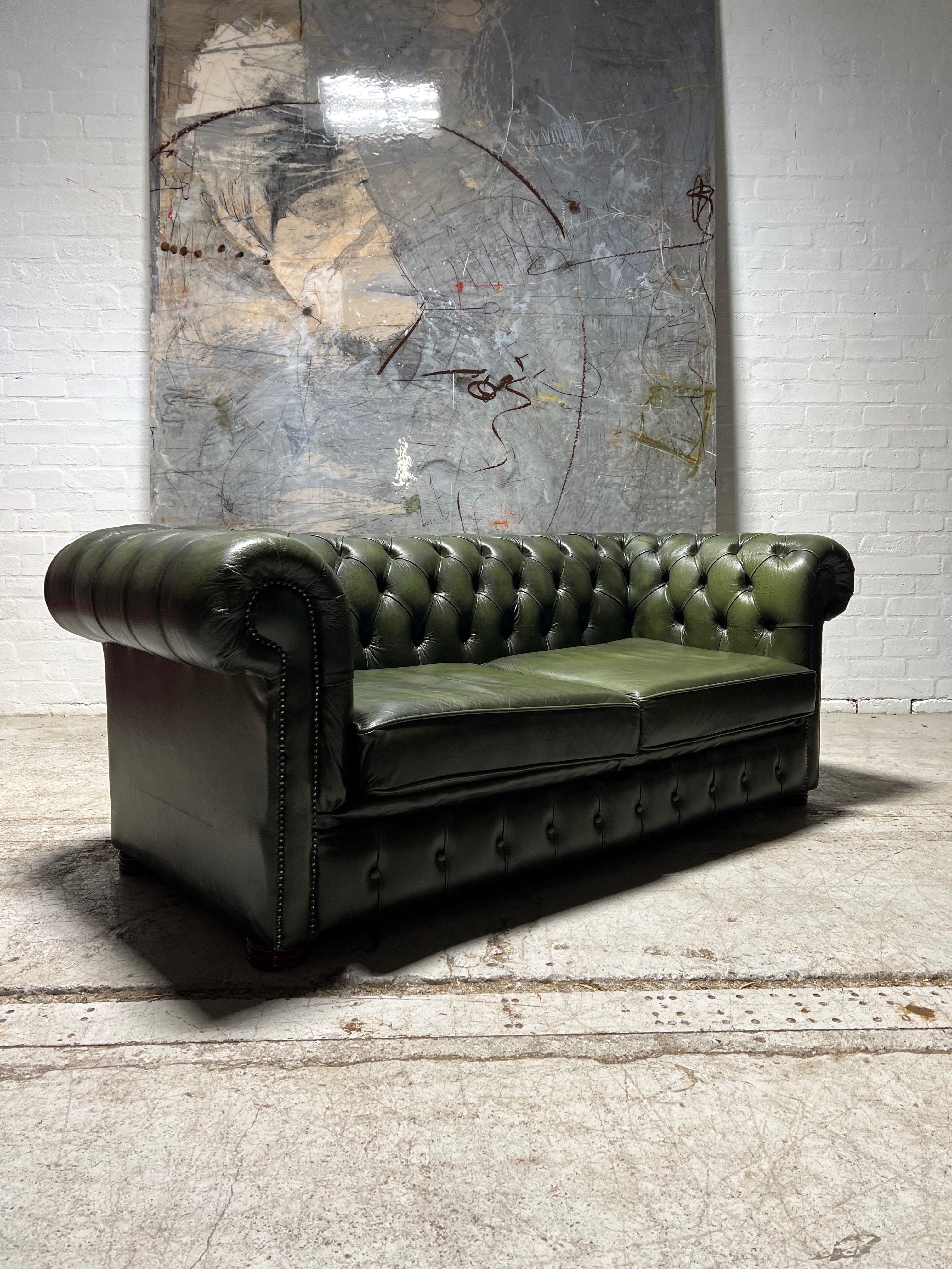 A Super Large 2 Seat Leather Chesterfield Sofa in Forest Green