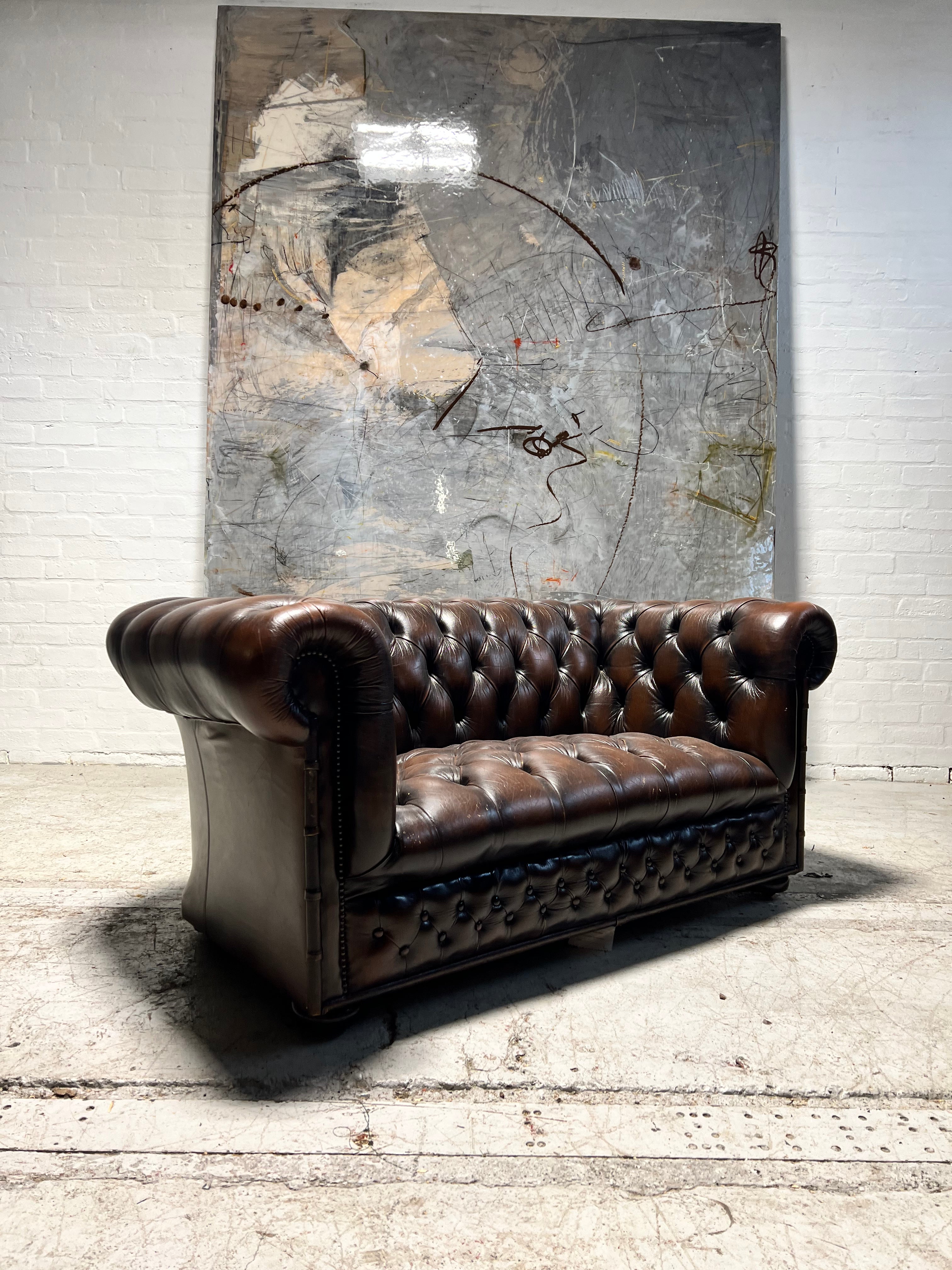 A Lovely Little Brown Leather Chesterfield 2 Seat Sofa