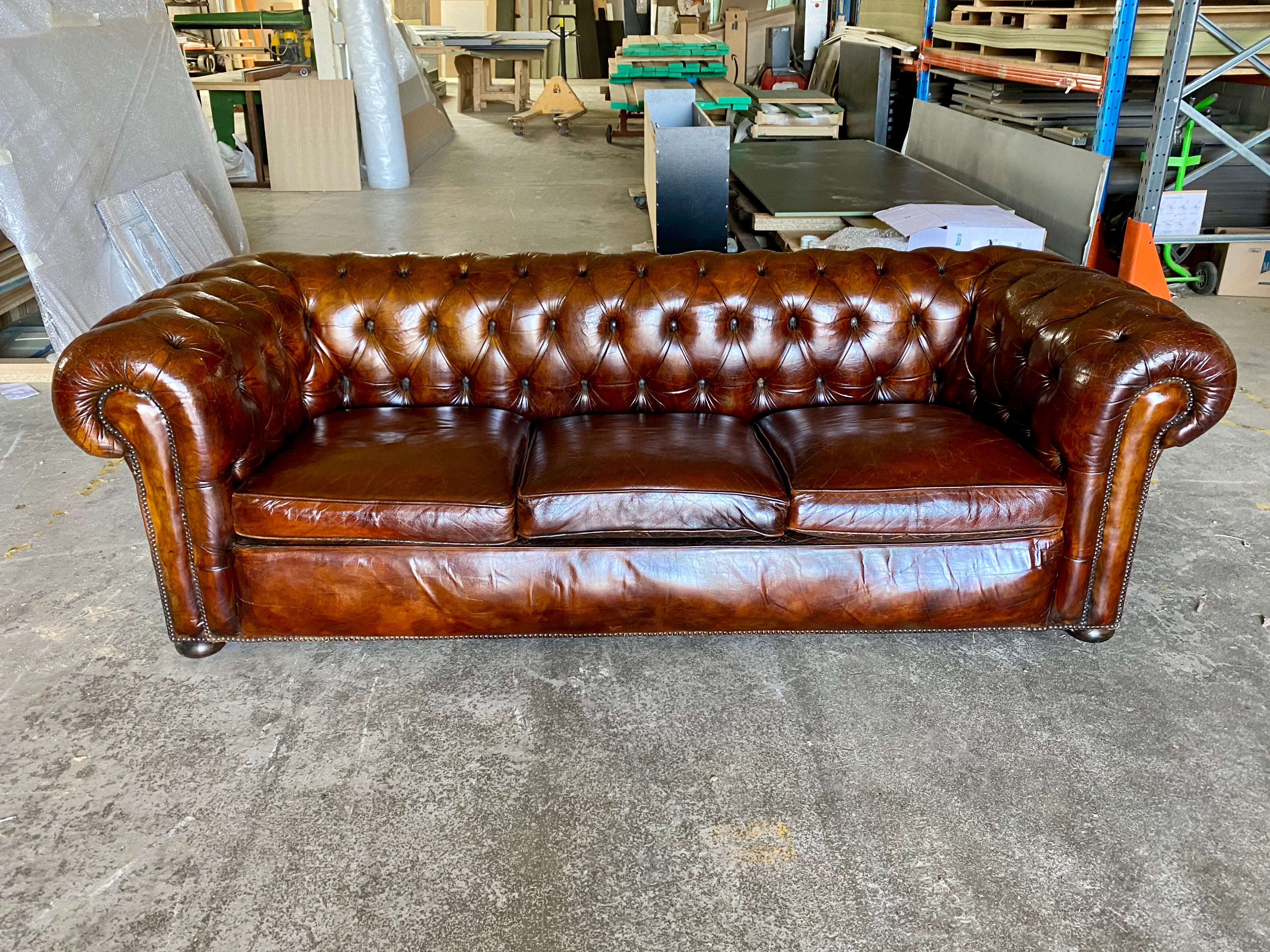 A Very Smart MidC Hand Dyed Leather Chesterfield Sofa in Conker