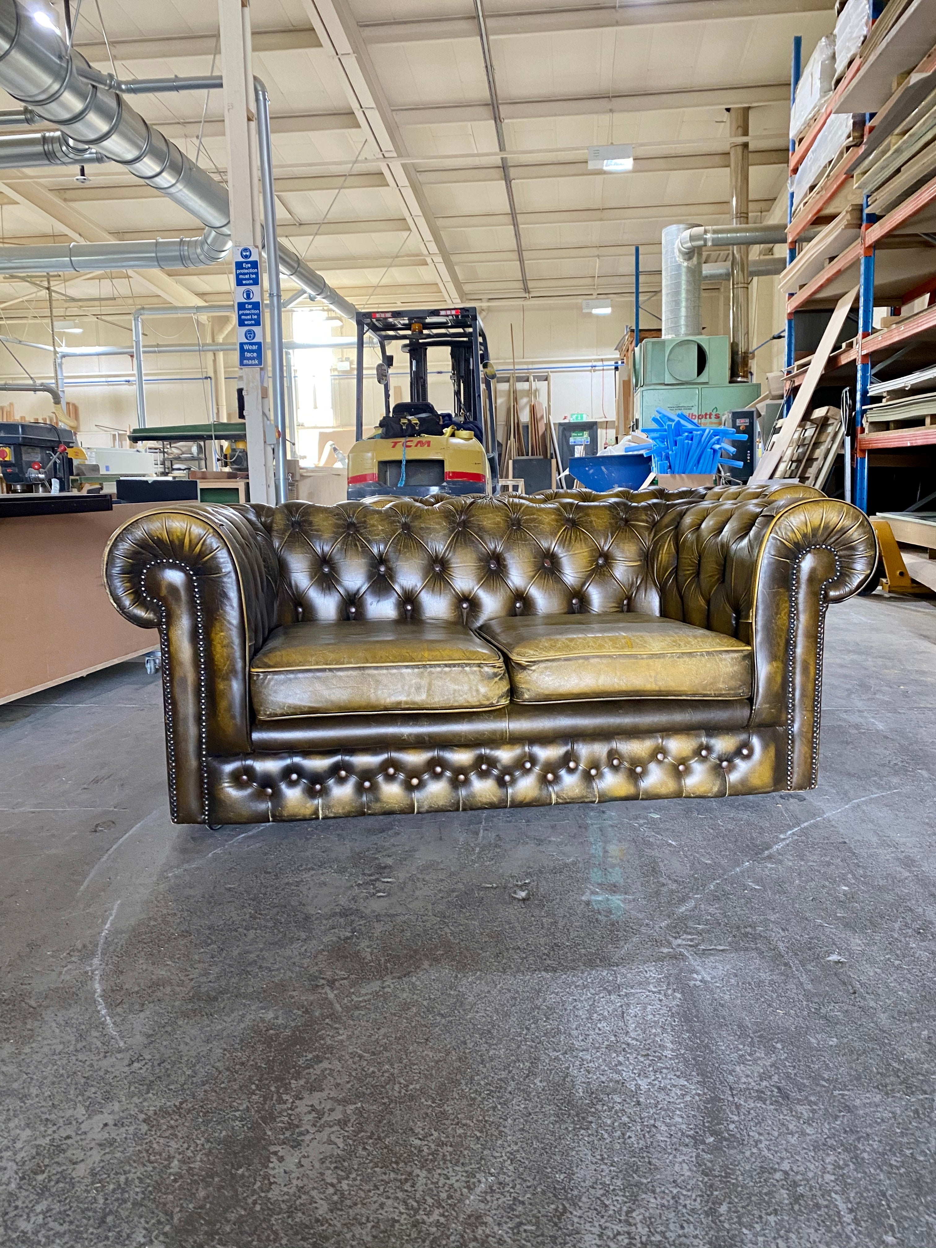 A Very Cool Pair of 2 seat Chesterfield Sofas in Autumn Tans