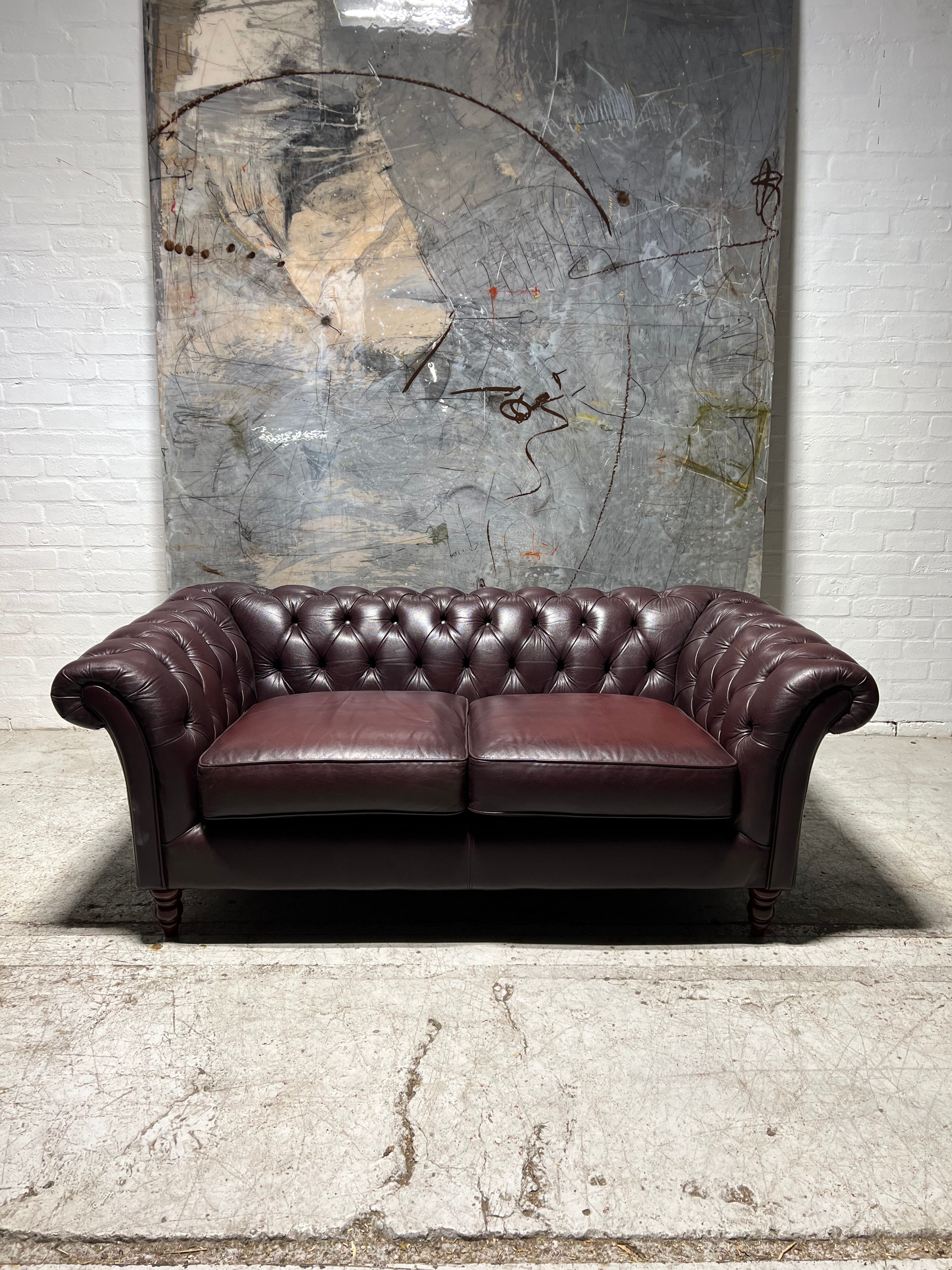 A Lovely Rich Plum Leather Chesterfield Sofa