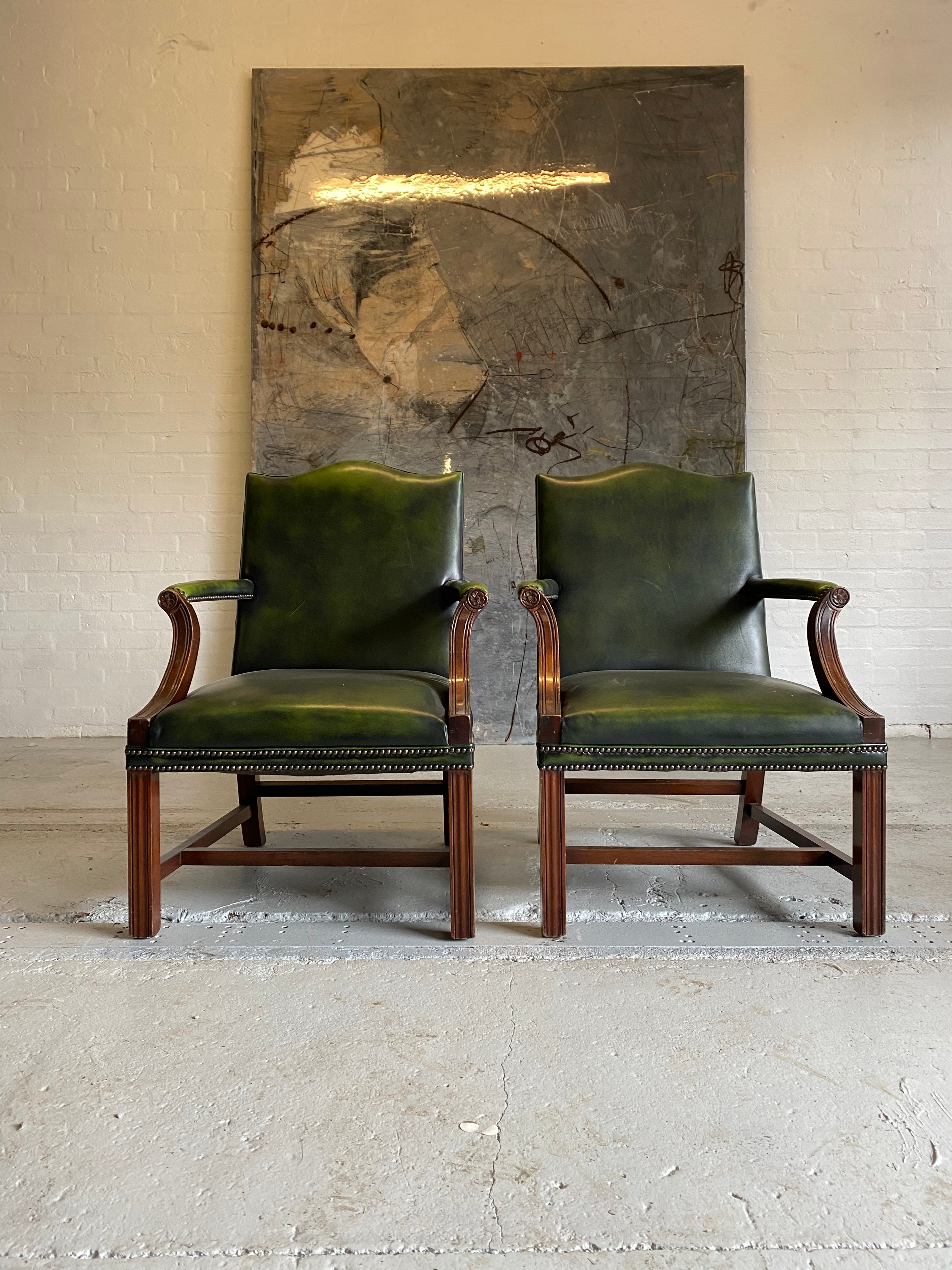 A Beautiful Pair of Library Chairs in Deep Green Leathers