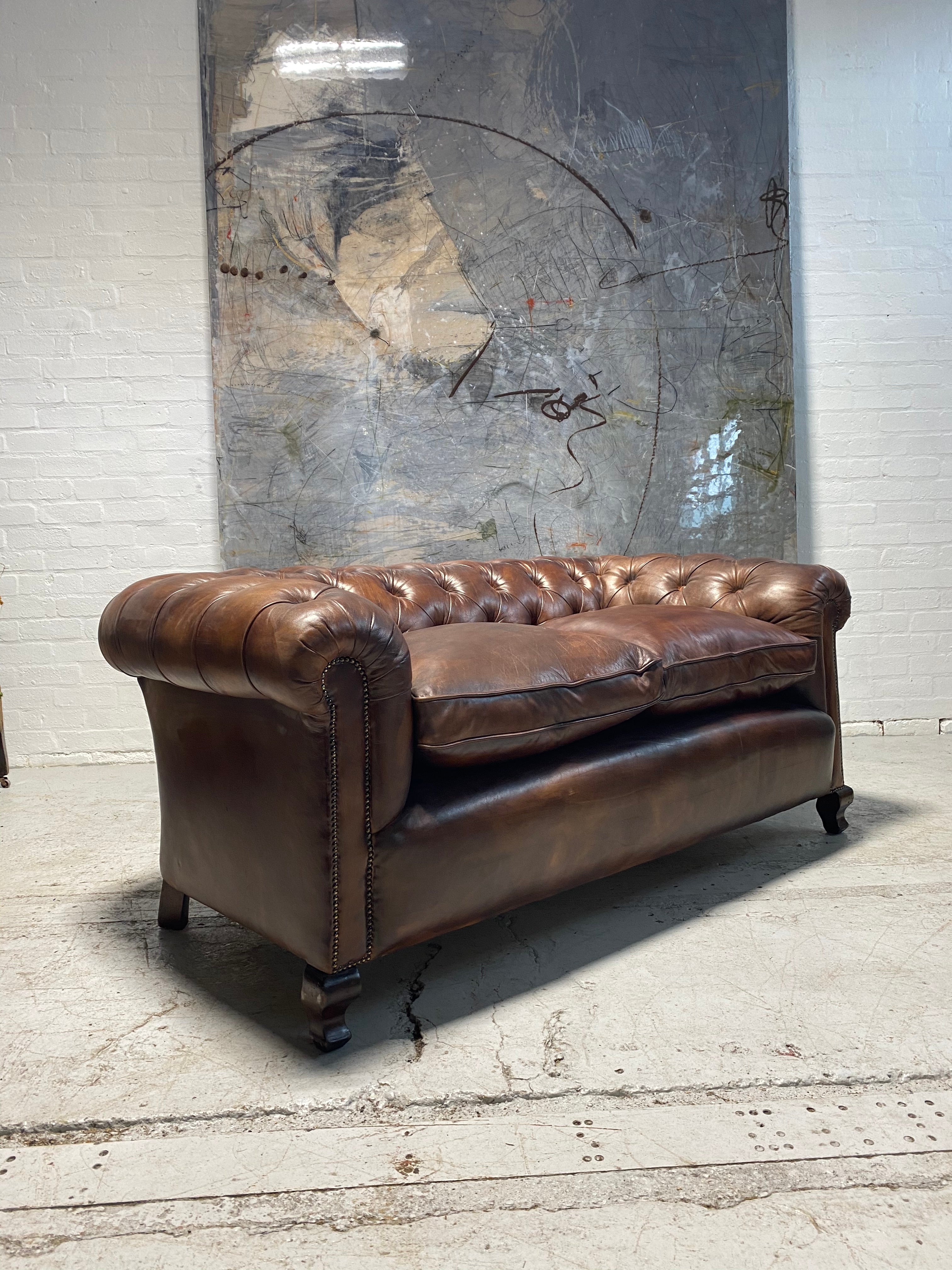 A Beautiful Restored Antique Sofa in Hand Dyed Leathers Circa 1900