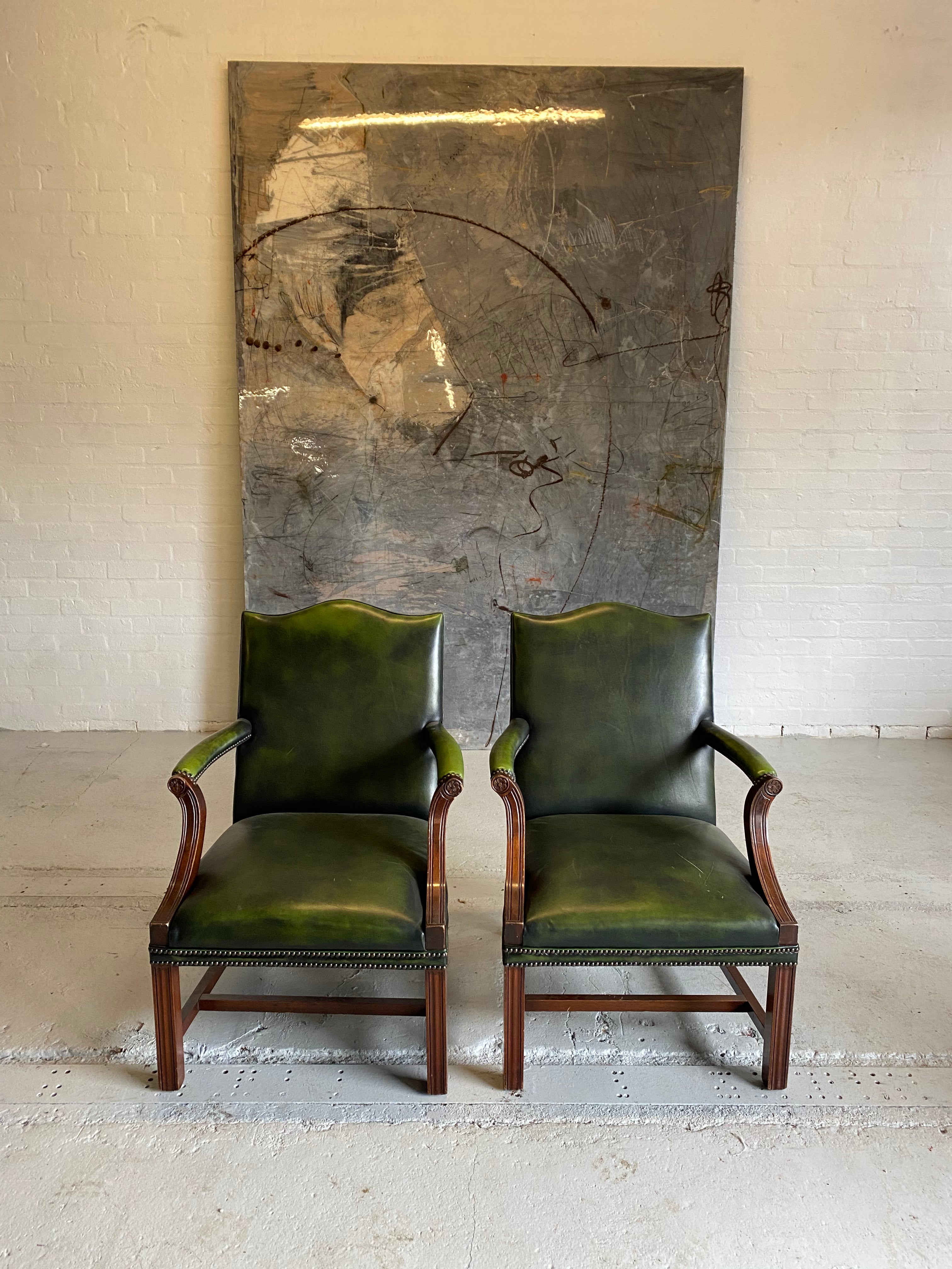 A Beautiful Pair of Library Chairs in Deep Green Leathers