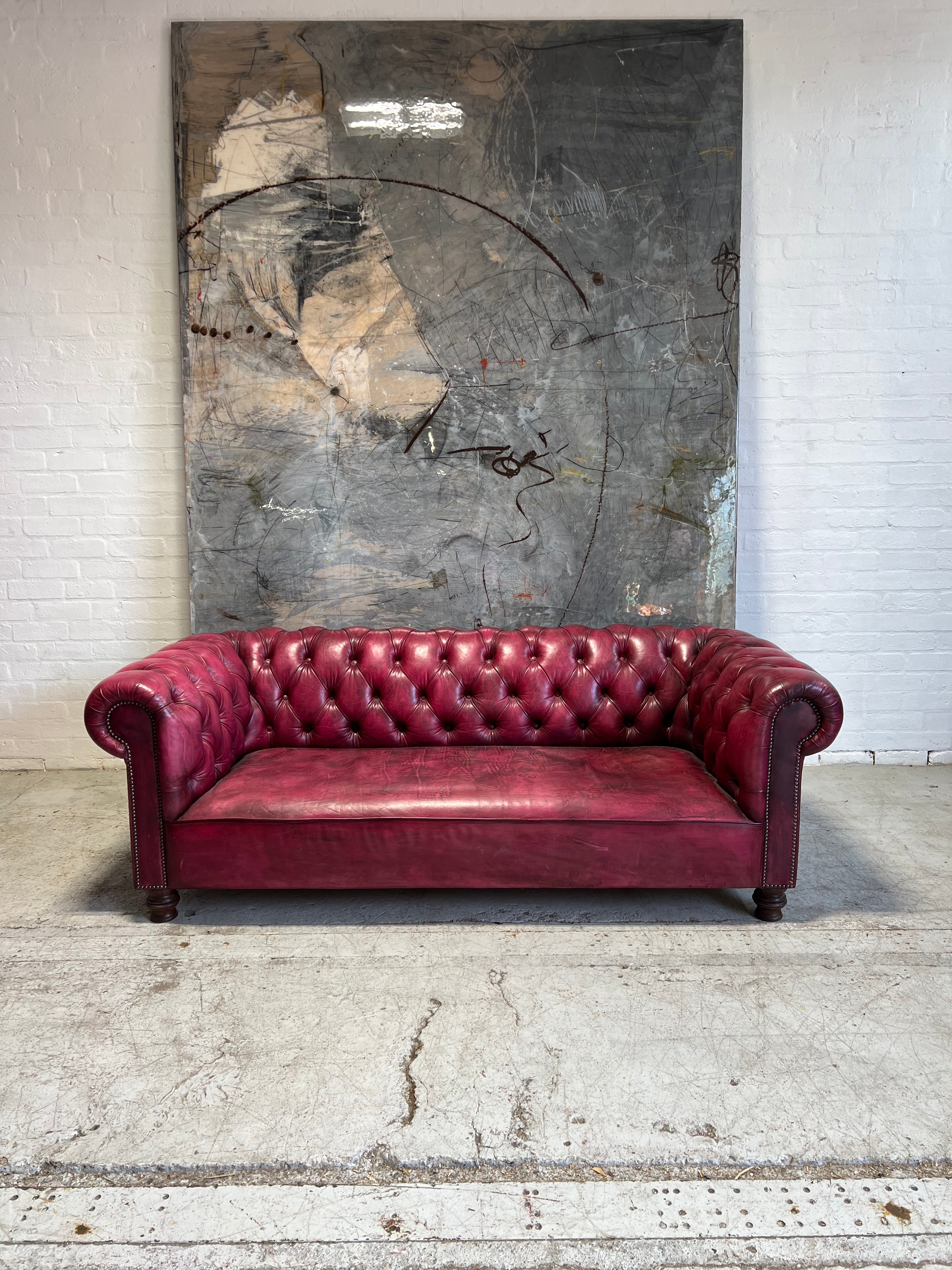 One of our Own Milena Chesterfield Sofas in Raspberry Red Hand Dyed Leather