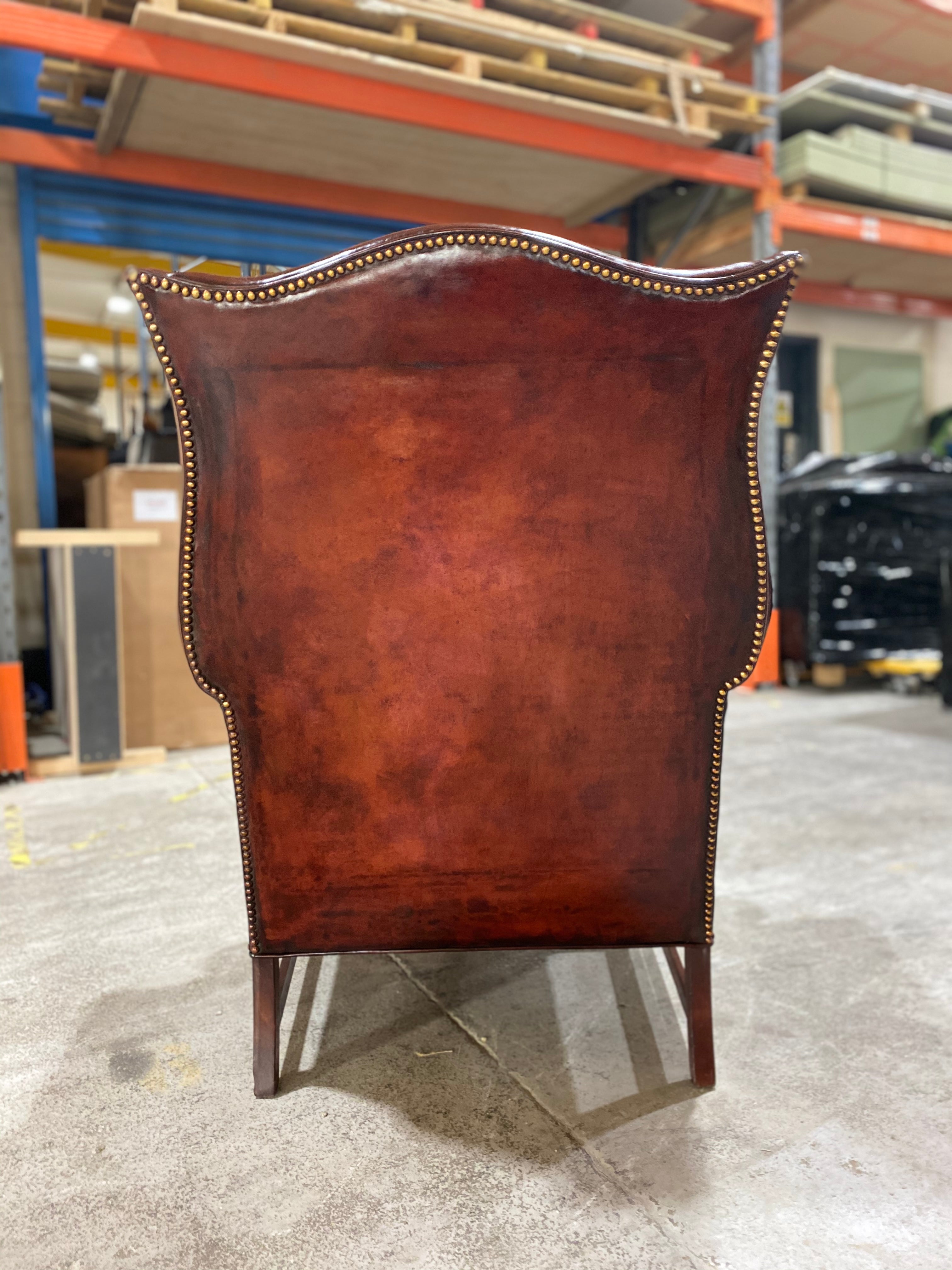 A Beautiful Early 20thC Gentleman’s Wing chair in Horse Chestnut