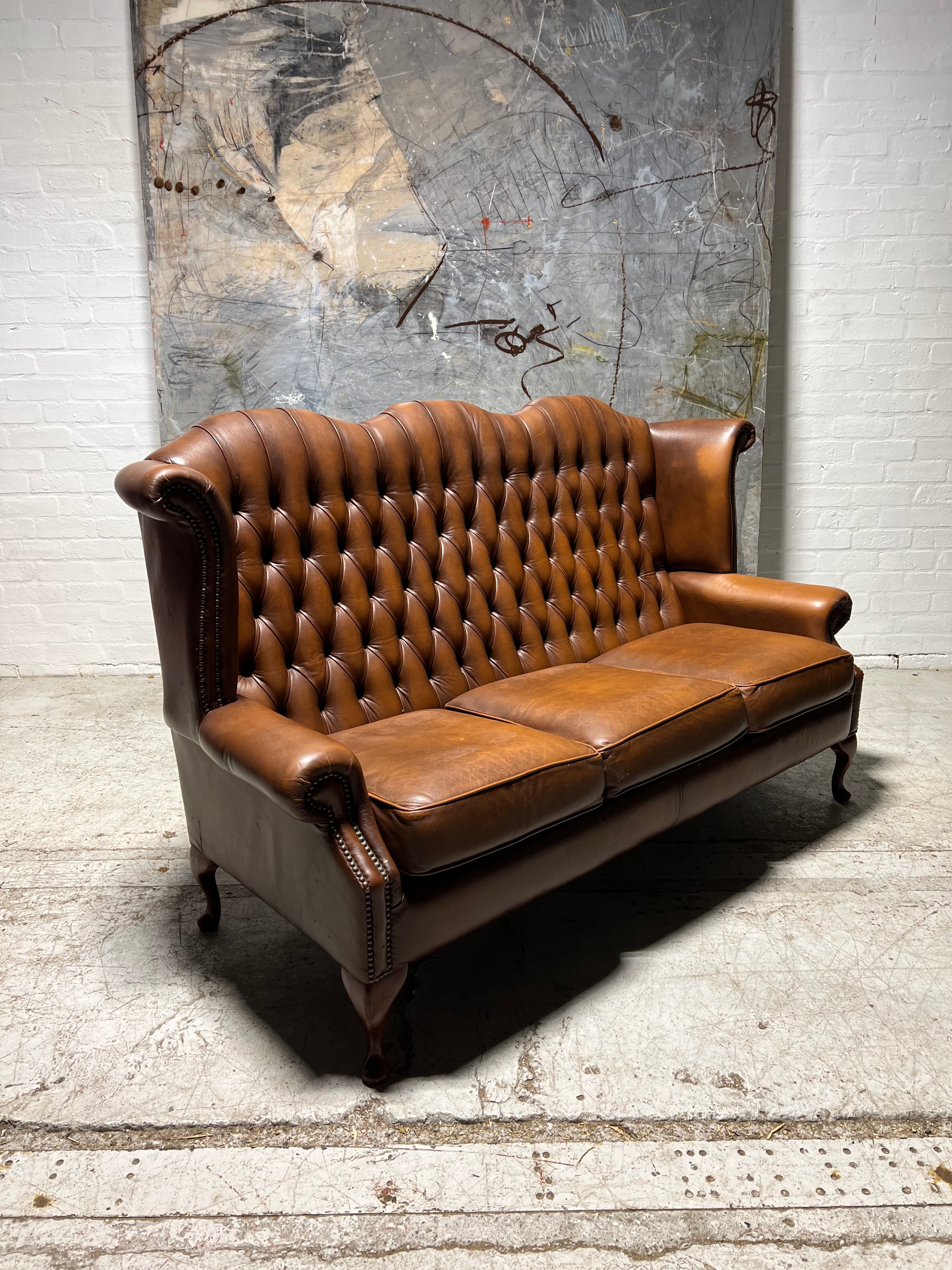 Beautiful Pair of Twice loved Chesterfield Wing Back Sofas in Caramel Tan