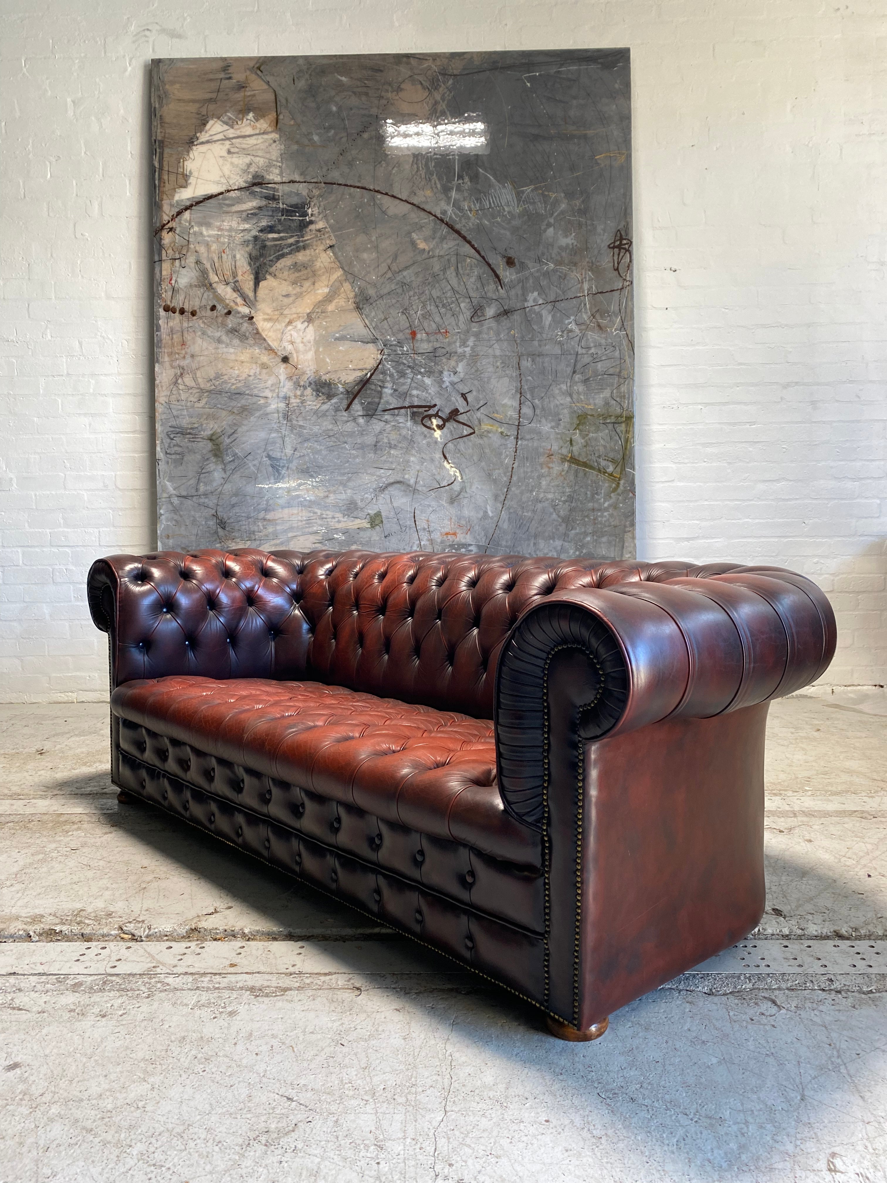 A Great Vintage MidC Chesterfield with Matching Club Chair