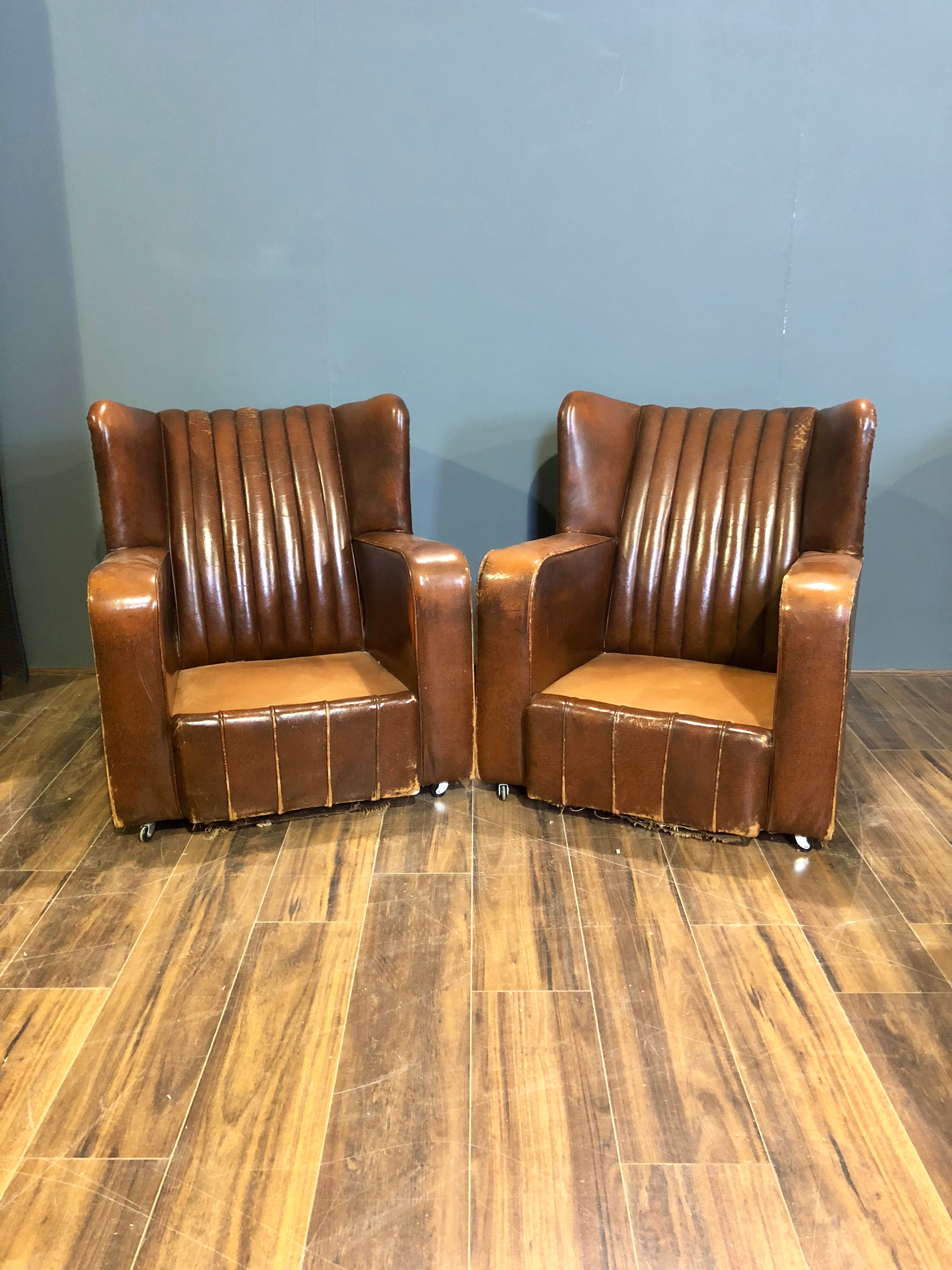 A Very Very Nice Matching Pair of Early 20thC Leather Armchairs