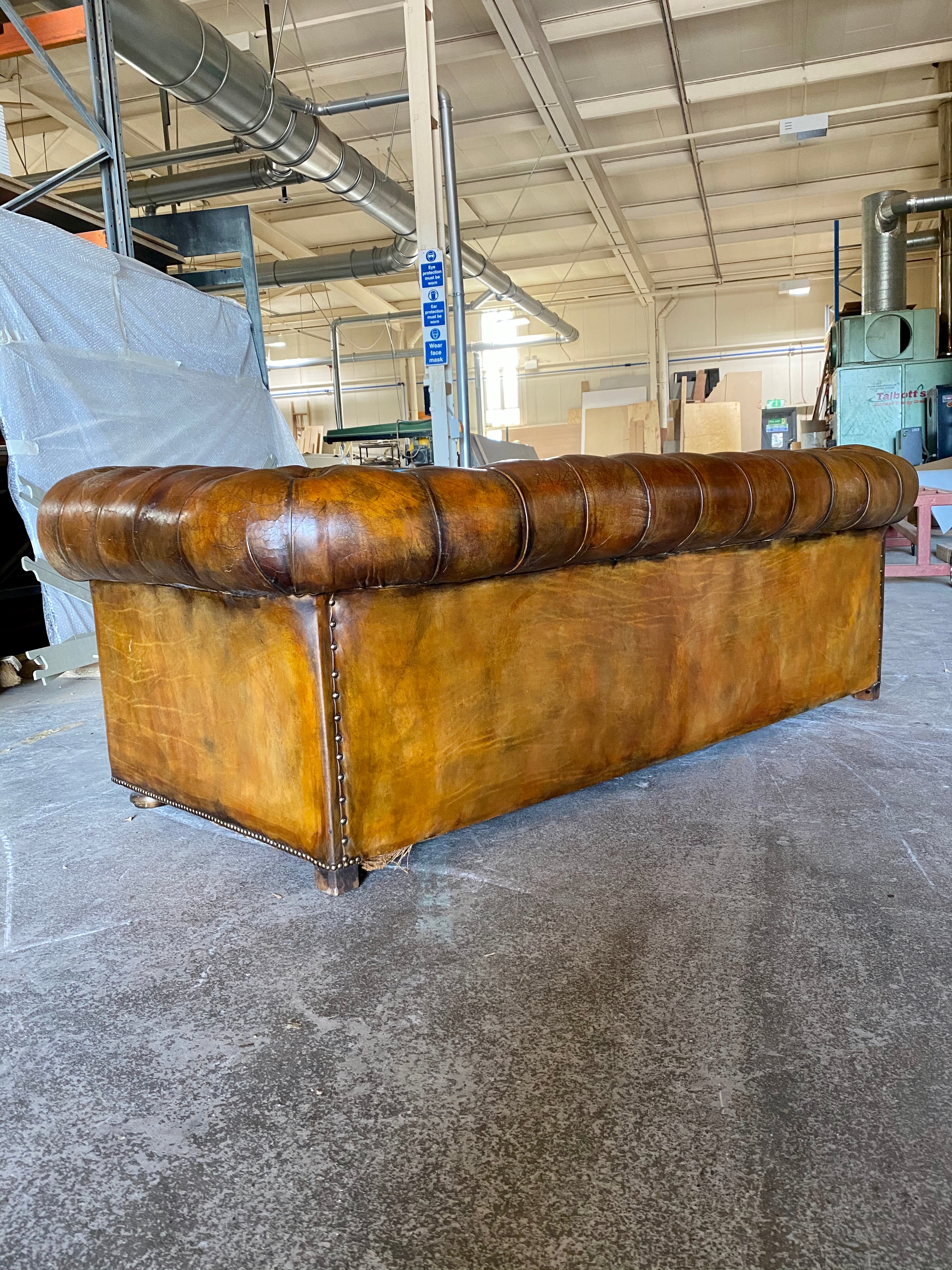 A Very Warm MidC Vintage Leather Chesterfield Sofa