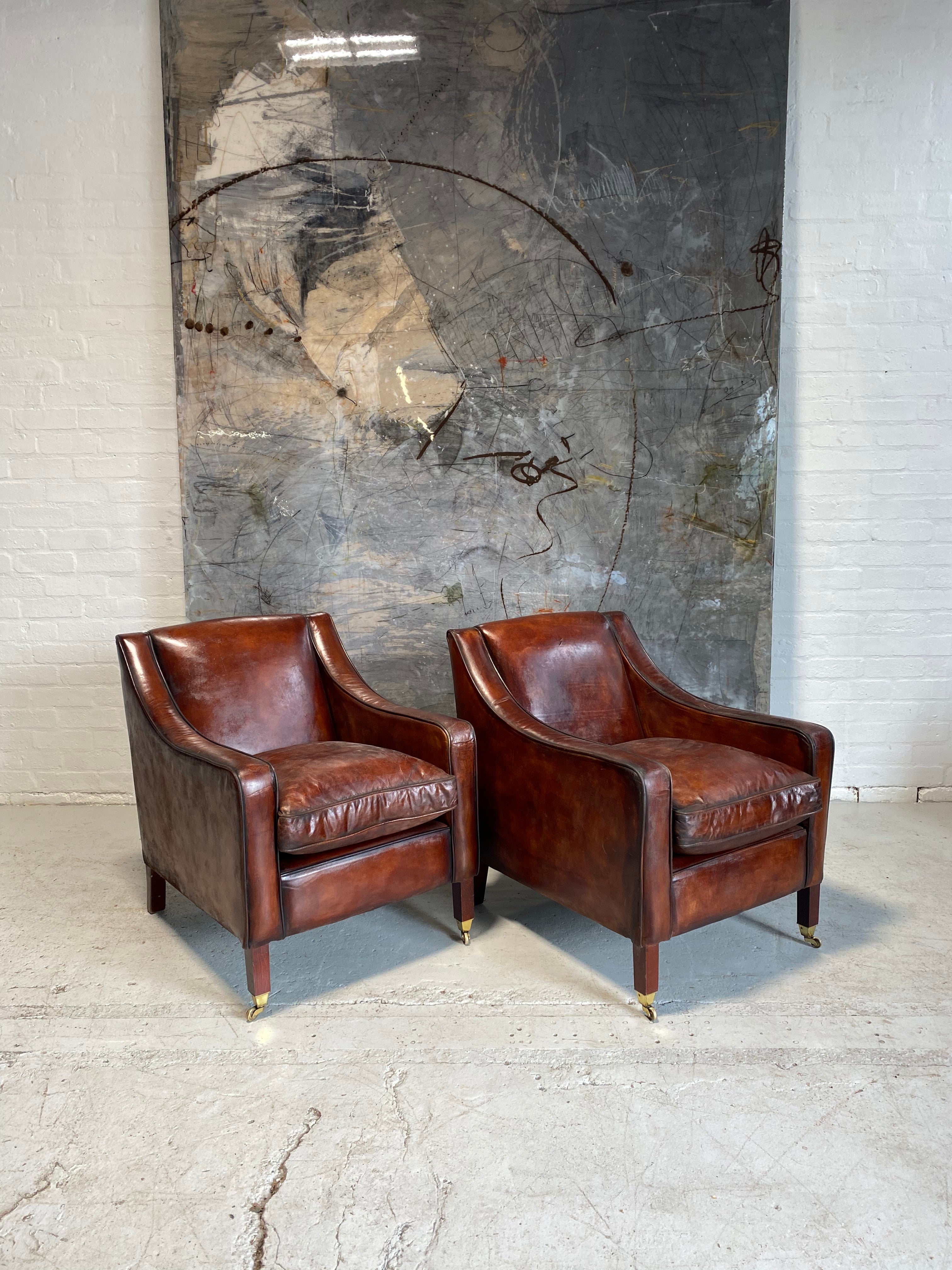 A Cool Pair of Armchairs in Hand Dyed Cognac Leathers