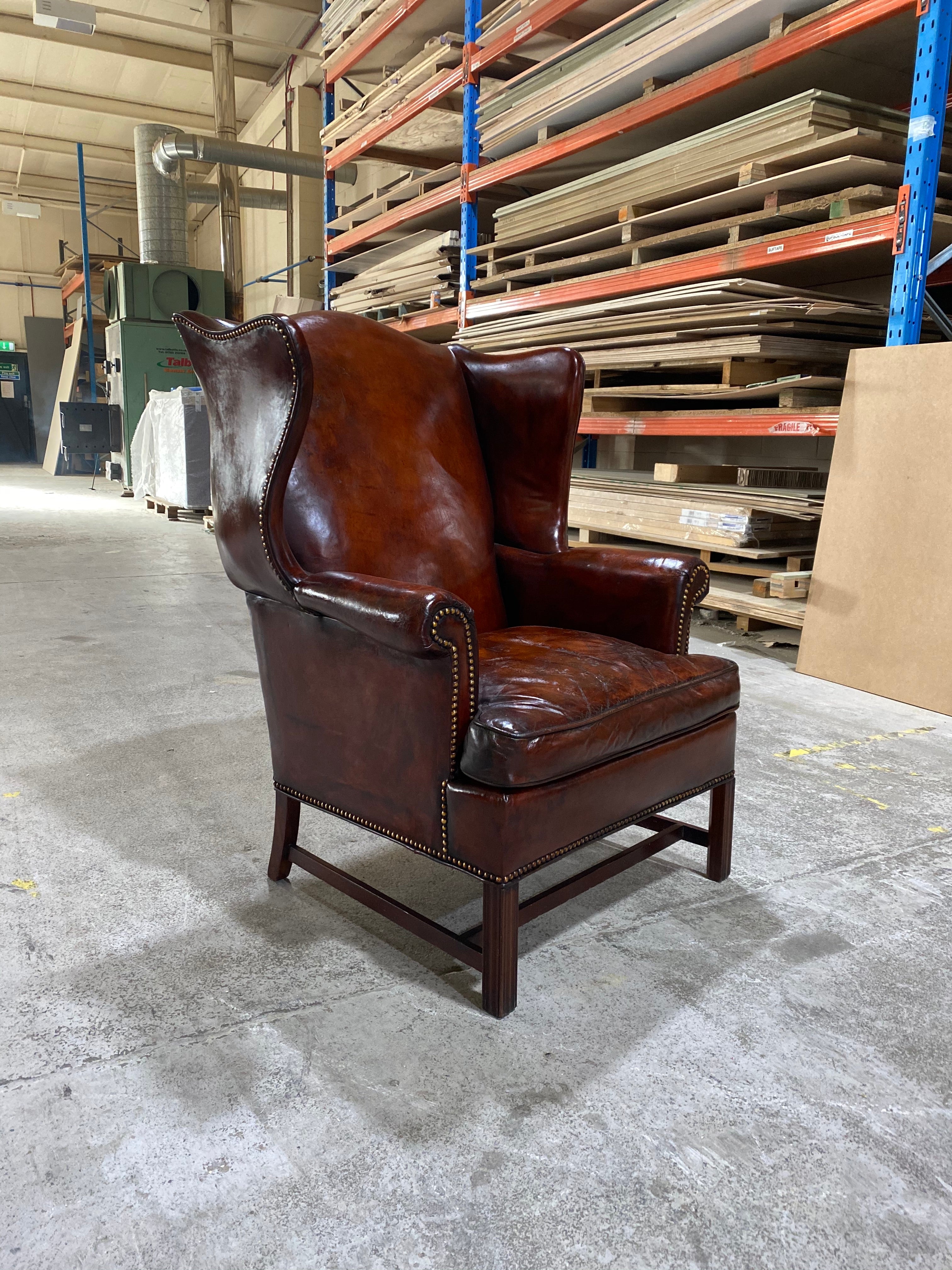 A Beautiful Early 20thC Gentleman’s Wing chair in Horse Chestnut