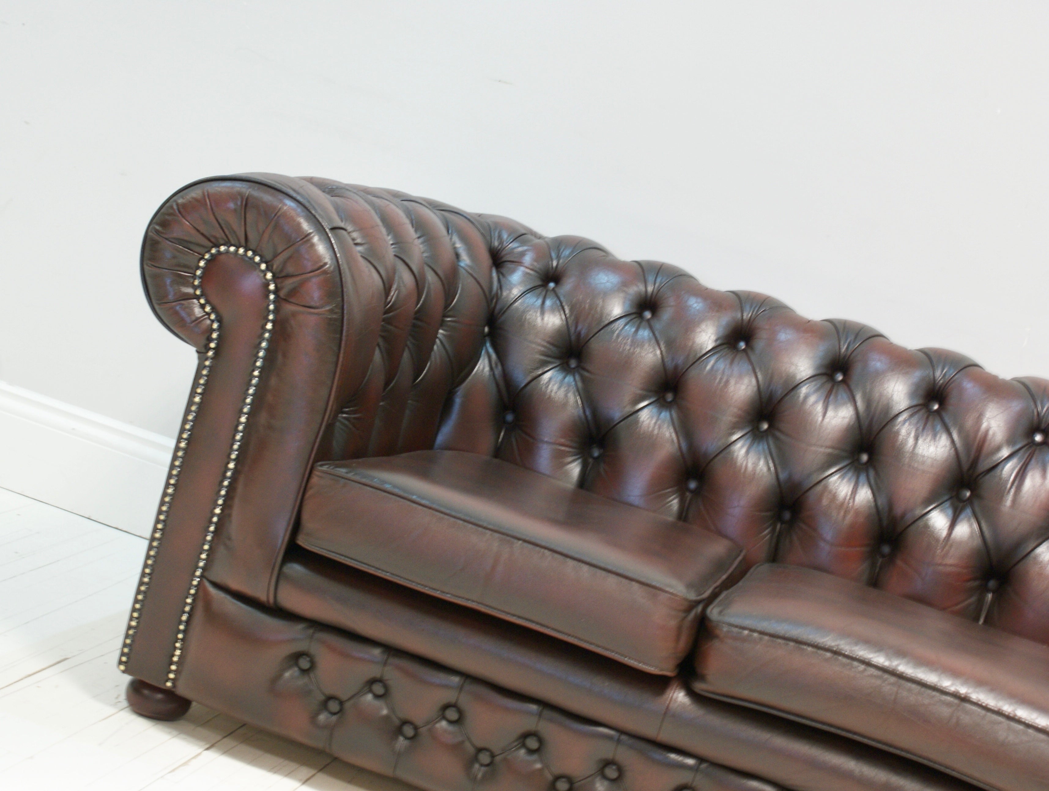 A Super Deep Wine Leather Second Hand Sofa