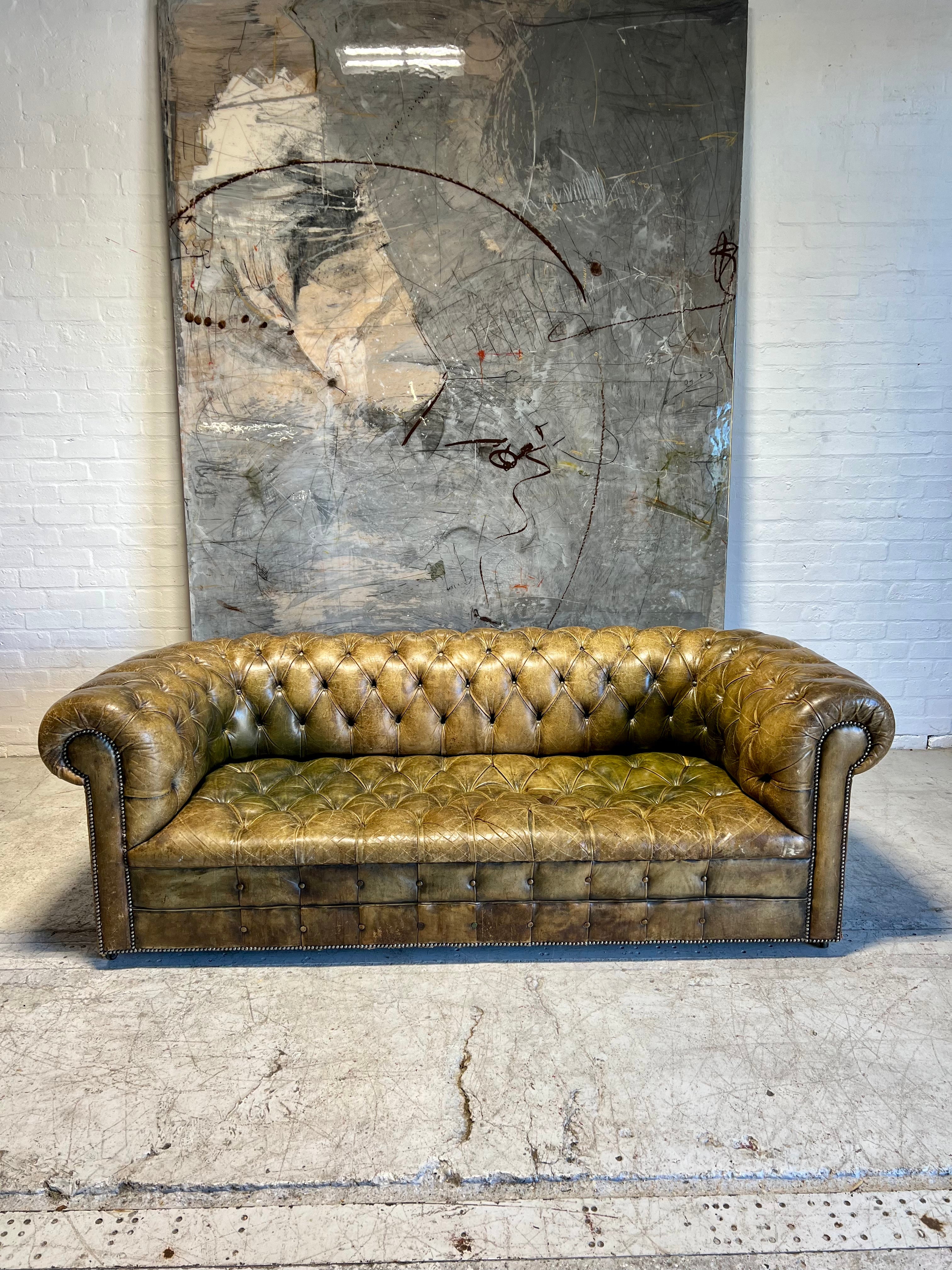 An Excellent MidC Vintage Leather Chesterfield Sofa in Original Hand Dyed Leathers