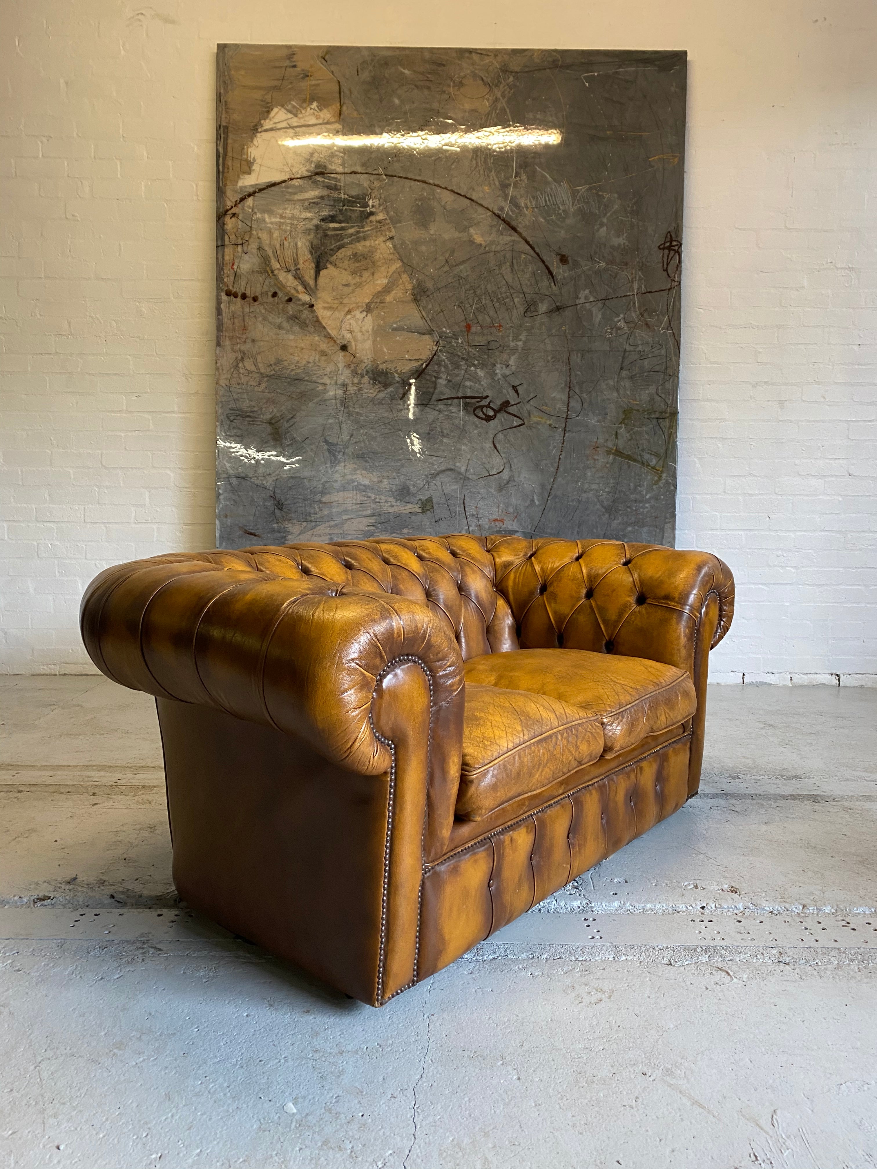 An Amazing Autumn Tan 2 seat Chesterfield Sofa