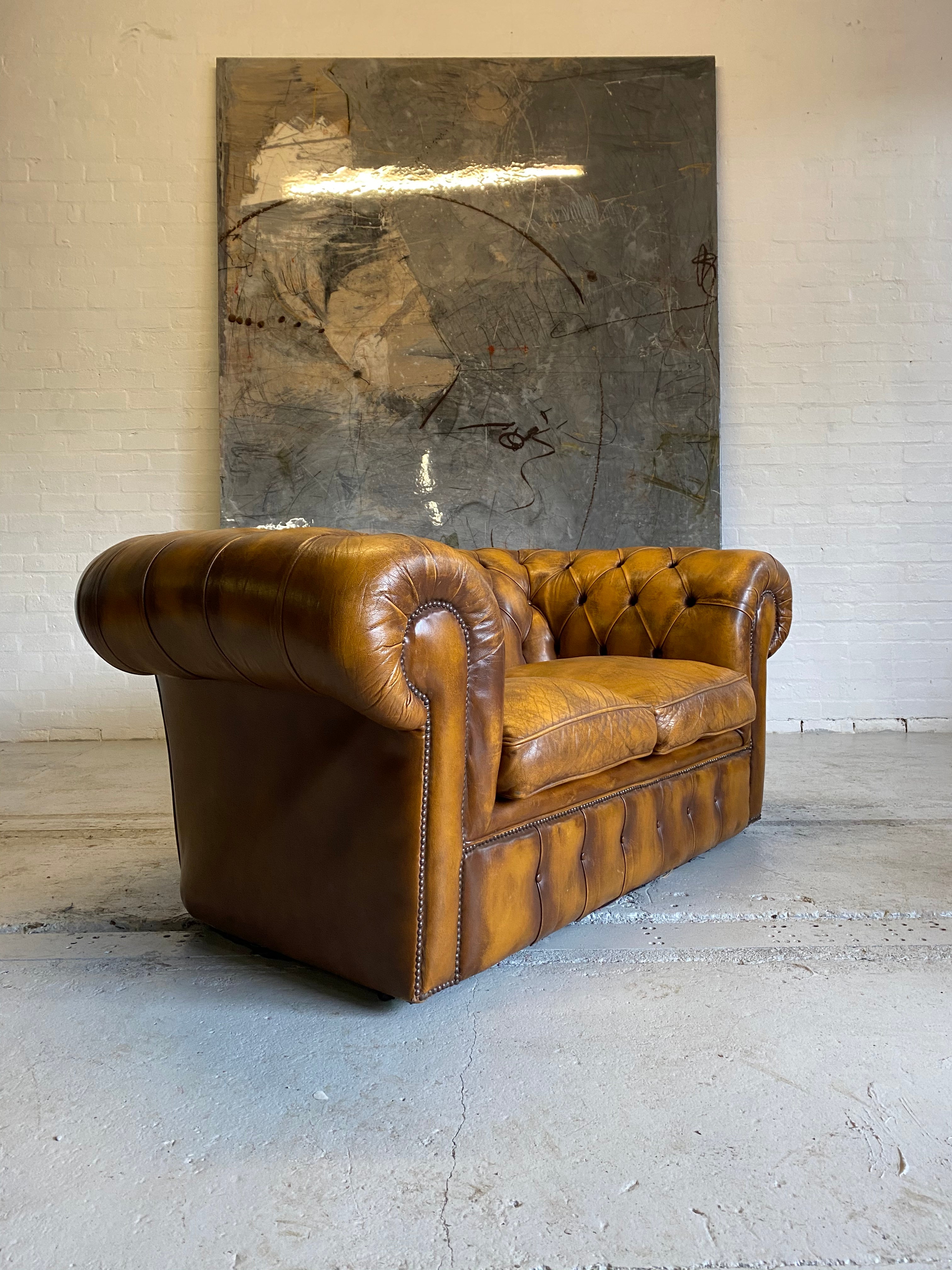 An Amazing Autumn Tan 2 seat Chesterfield Sofa