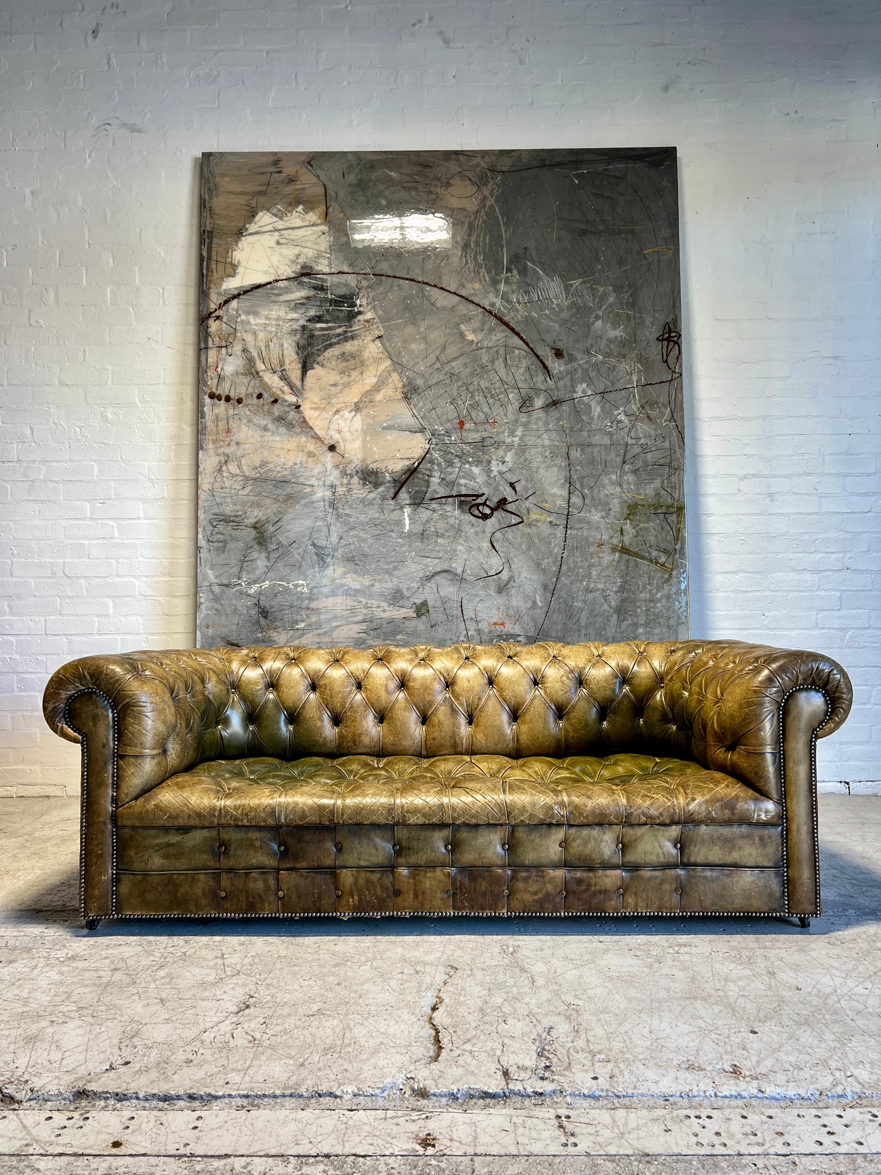 An Excellent MidC Vintage Leather Chesterfield Sofa in Original Hand Dyed Leathers