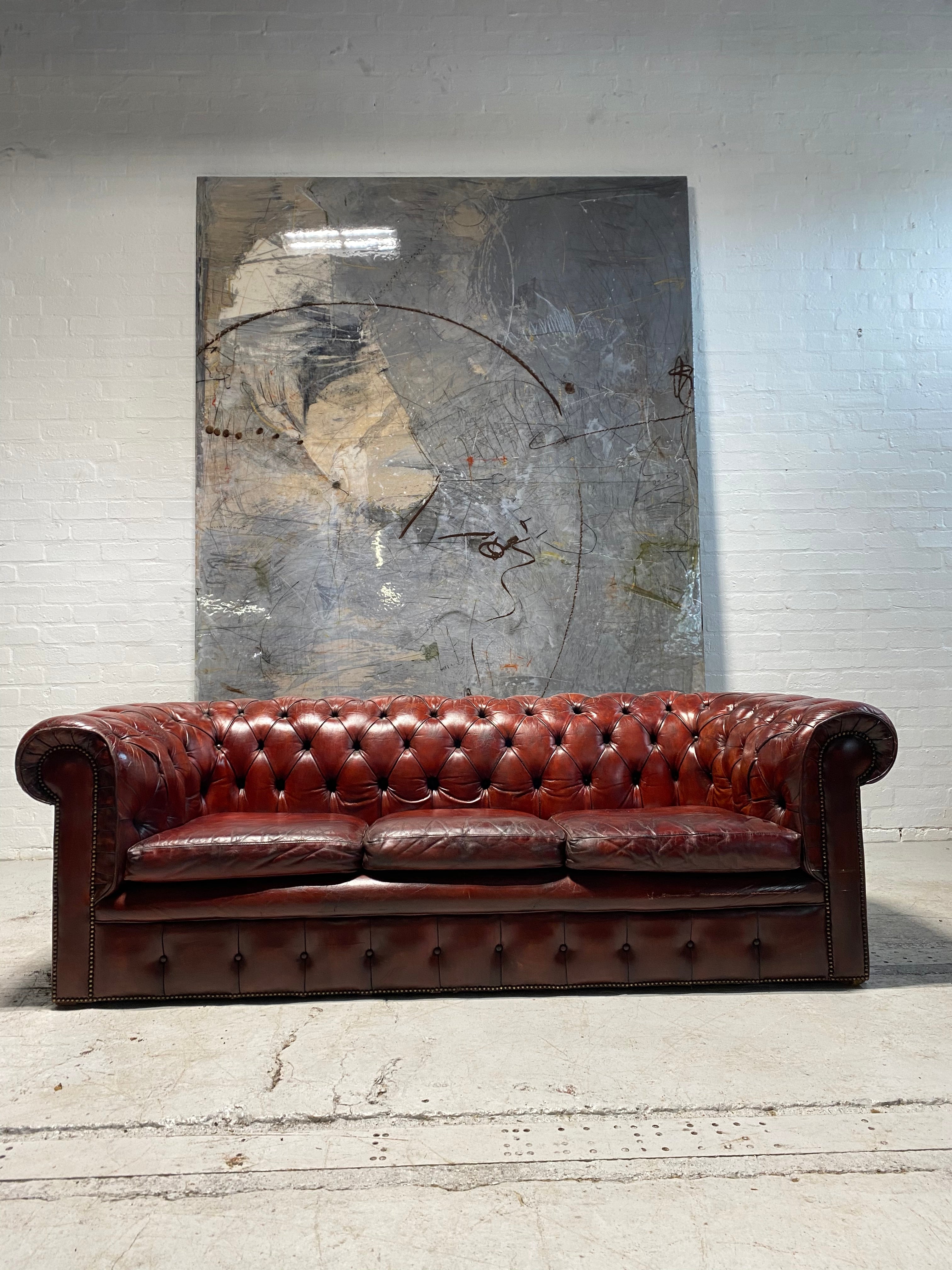 A Stunning MidC Vintage Chesterfield Sofa