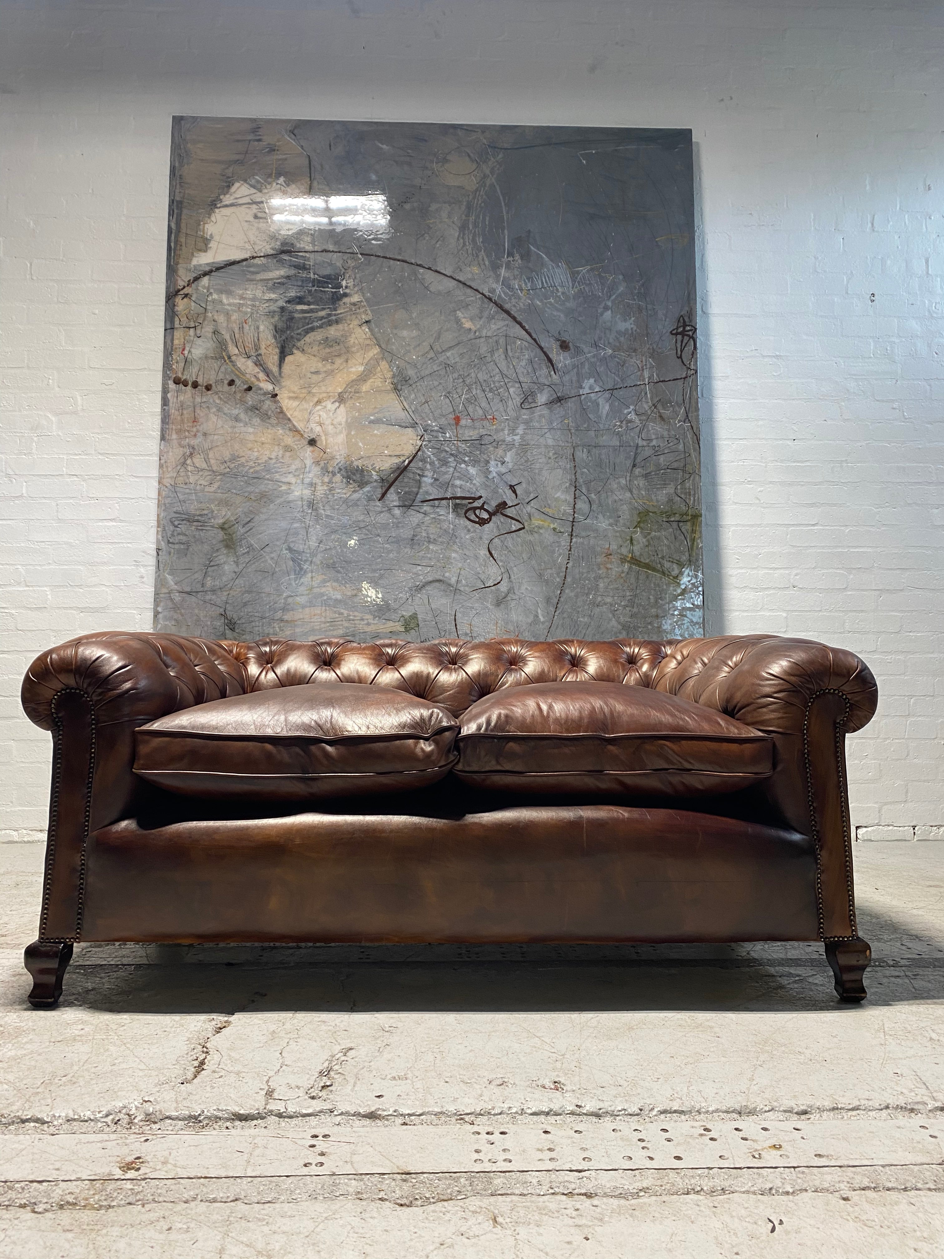 A Beautiful Restored Antique Sofa in Hand Dyed Leathers Circa 1900