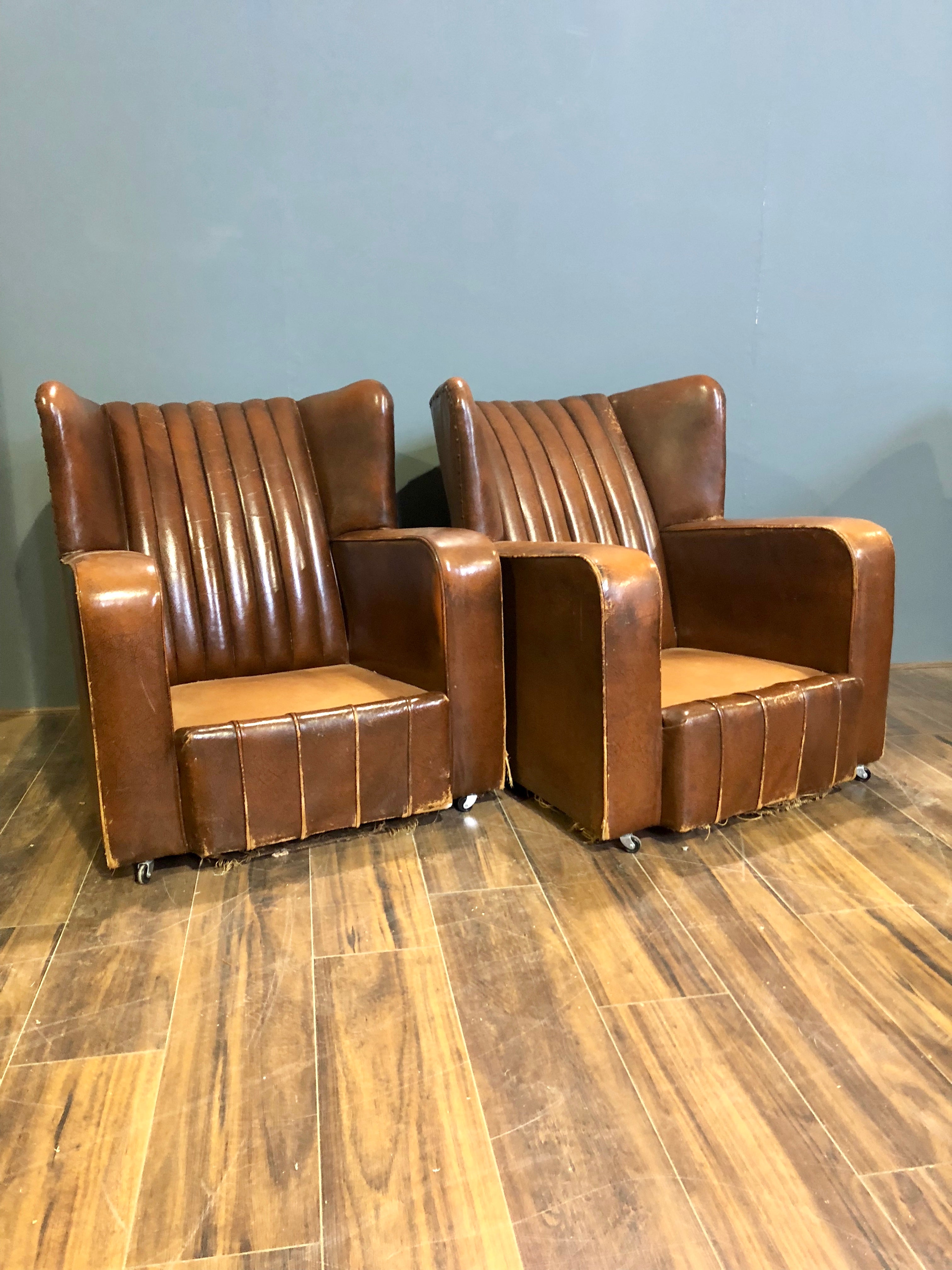 A Very Very Nice Matching Pair of Early 20thC Leather Armchairs