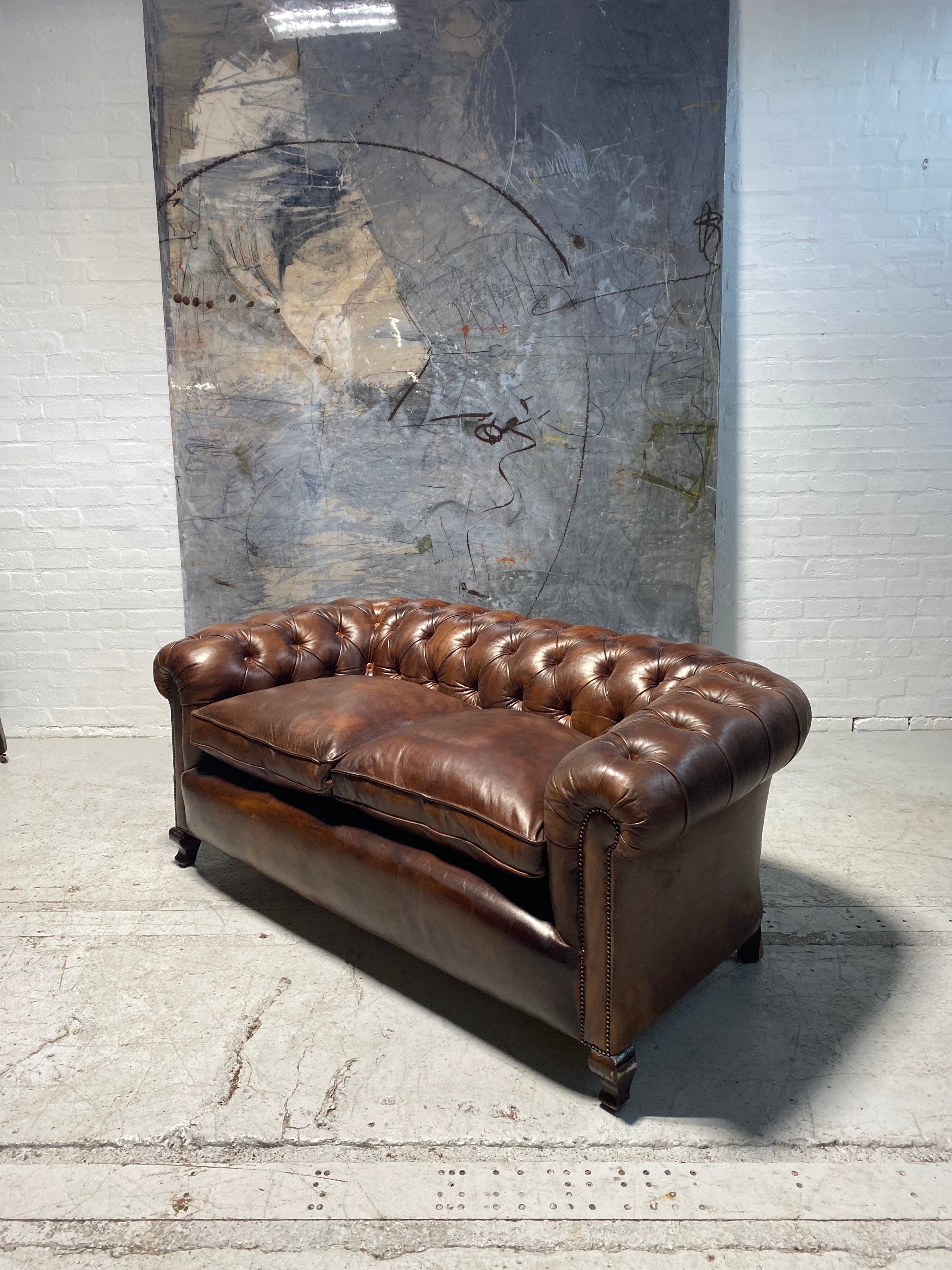 A Beautiful Restored Antique Sofa in Hand Dyed Leathers Circa 1900