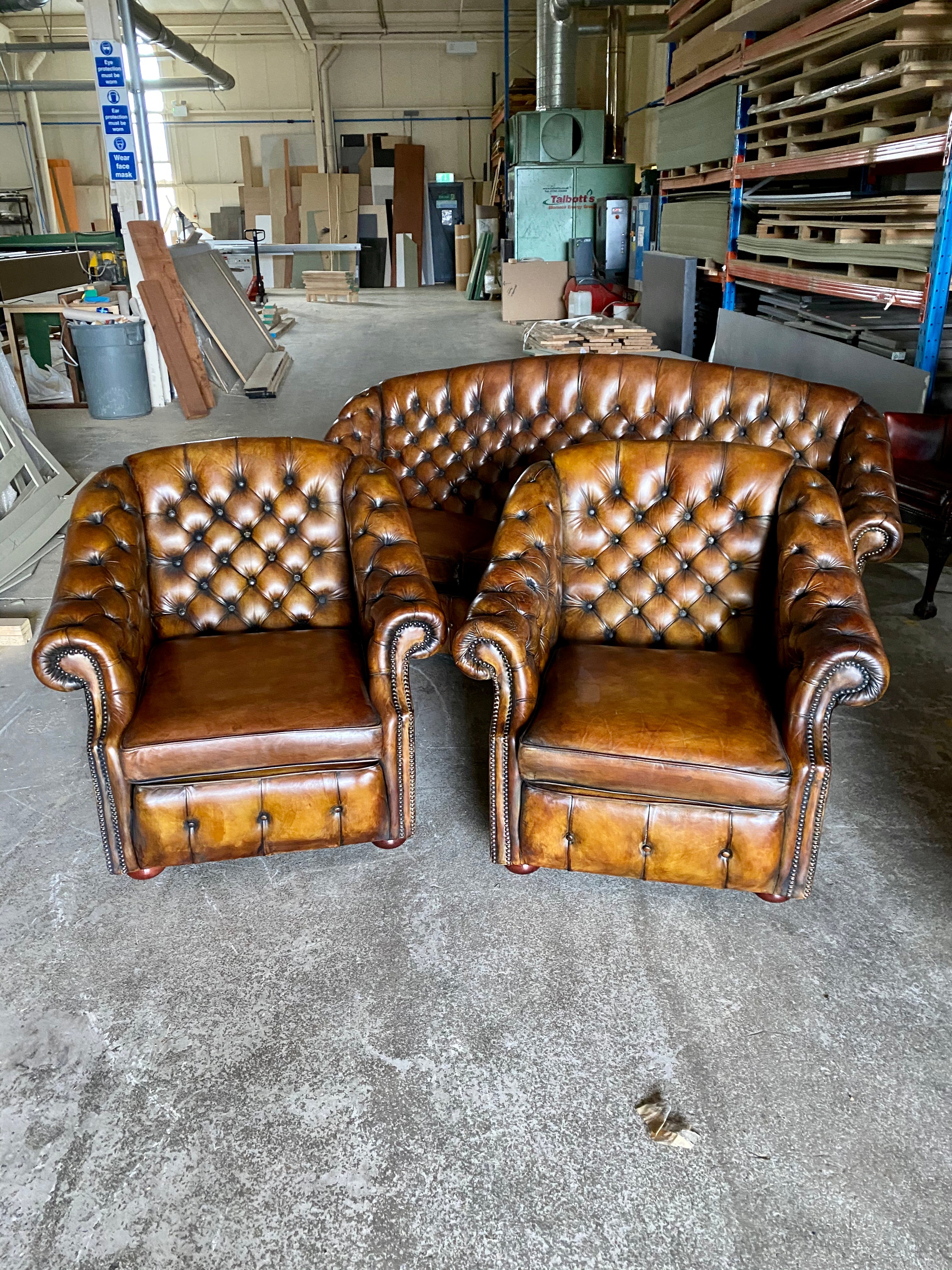 A Beautiful Arch Backed Chesterfield suite in Hand Dyed Leathers