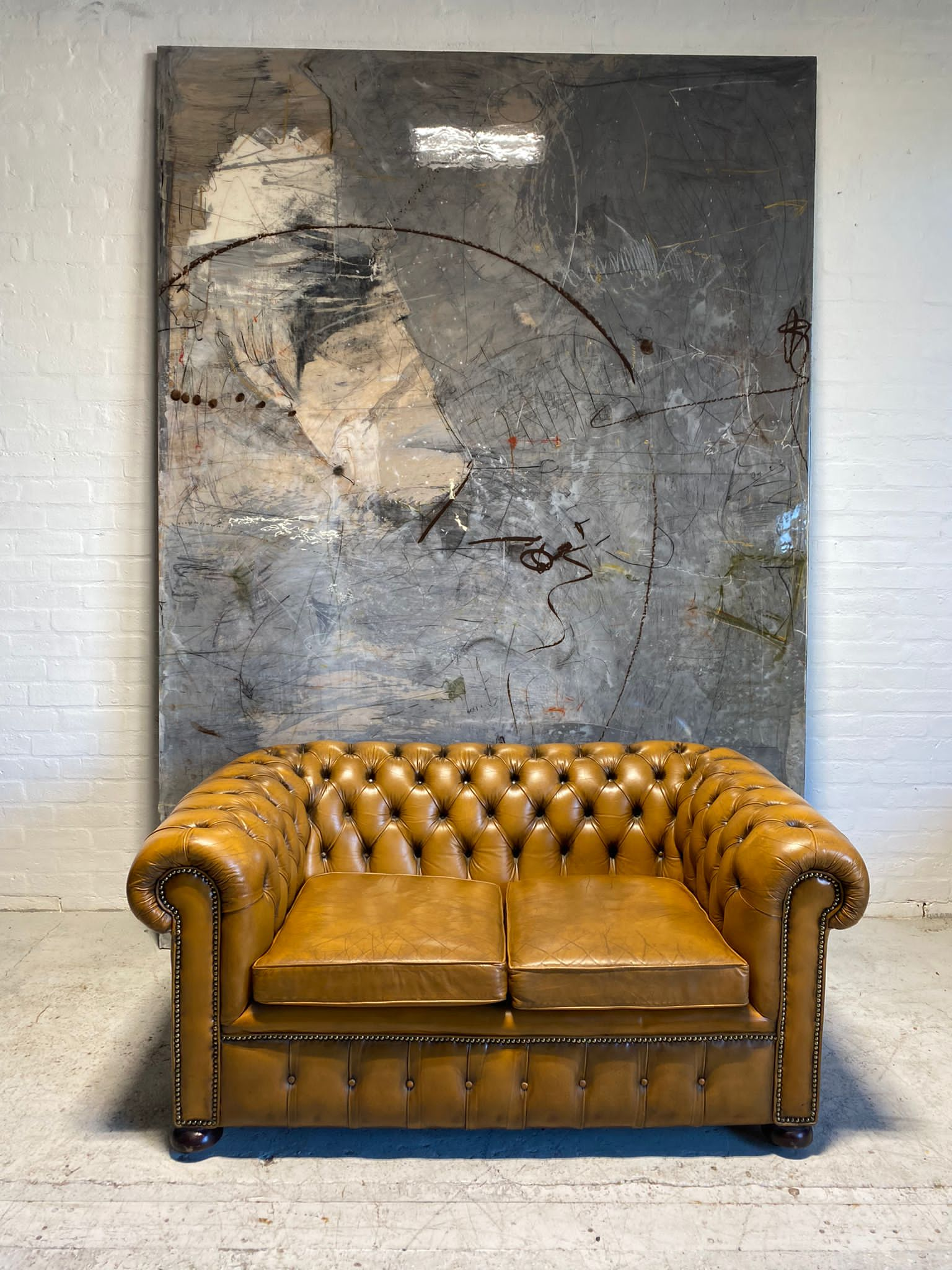 A Beautiful 2 Seater Chesterfield in Golden Tan Leather