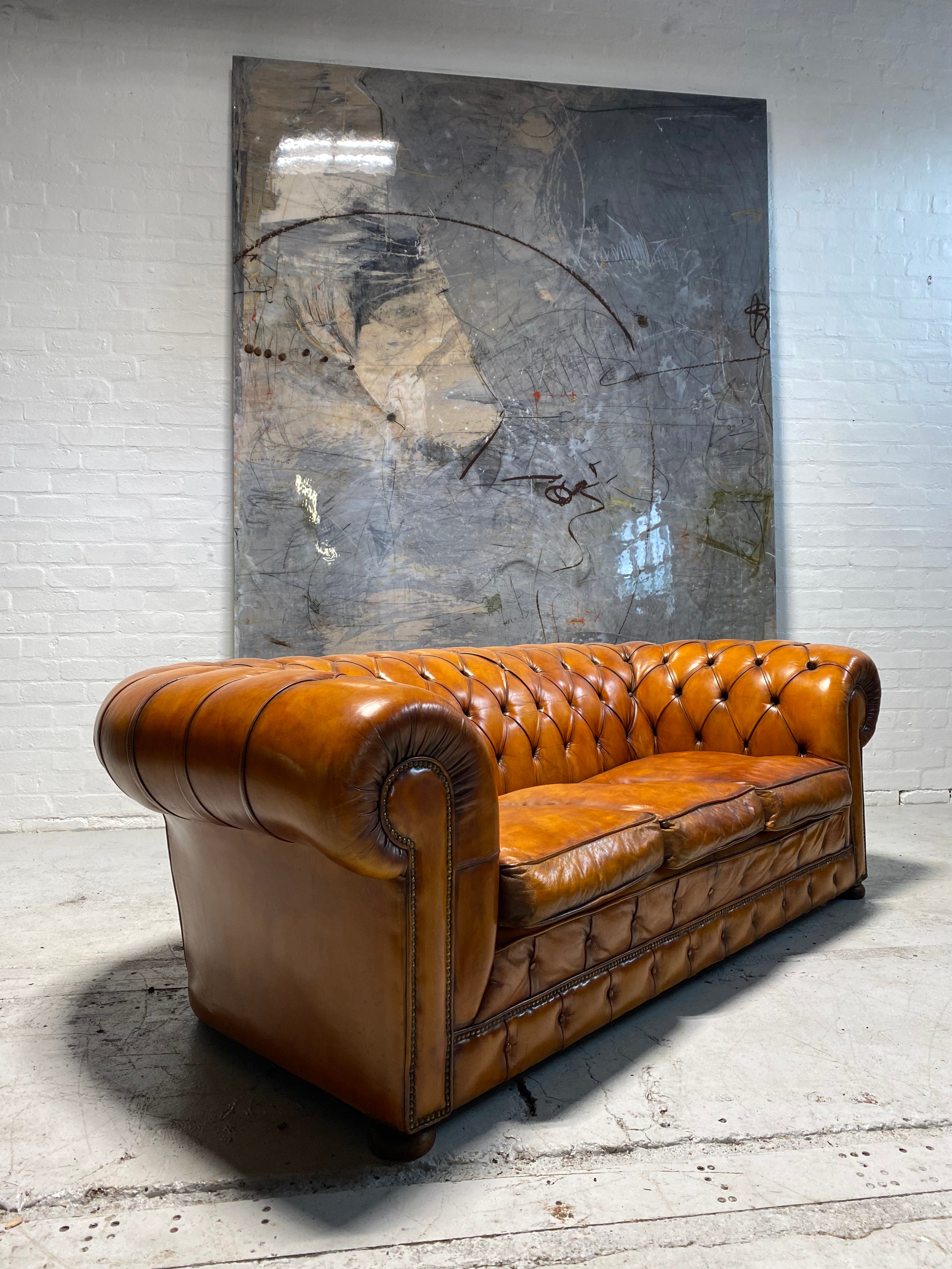 A Sumptuous Chesterfield in Hand Dyes Honey Tan Leathers