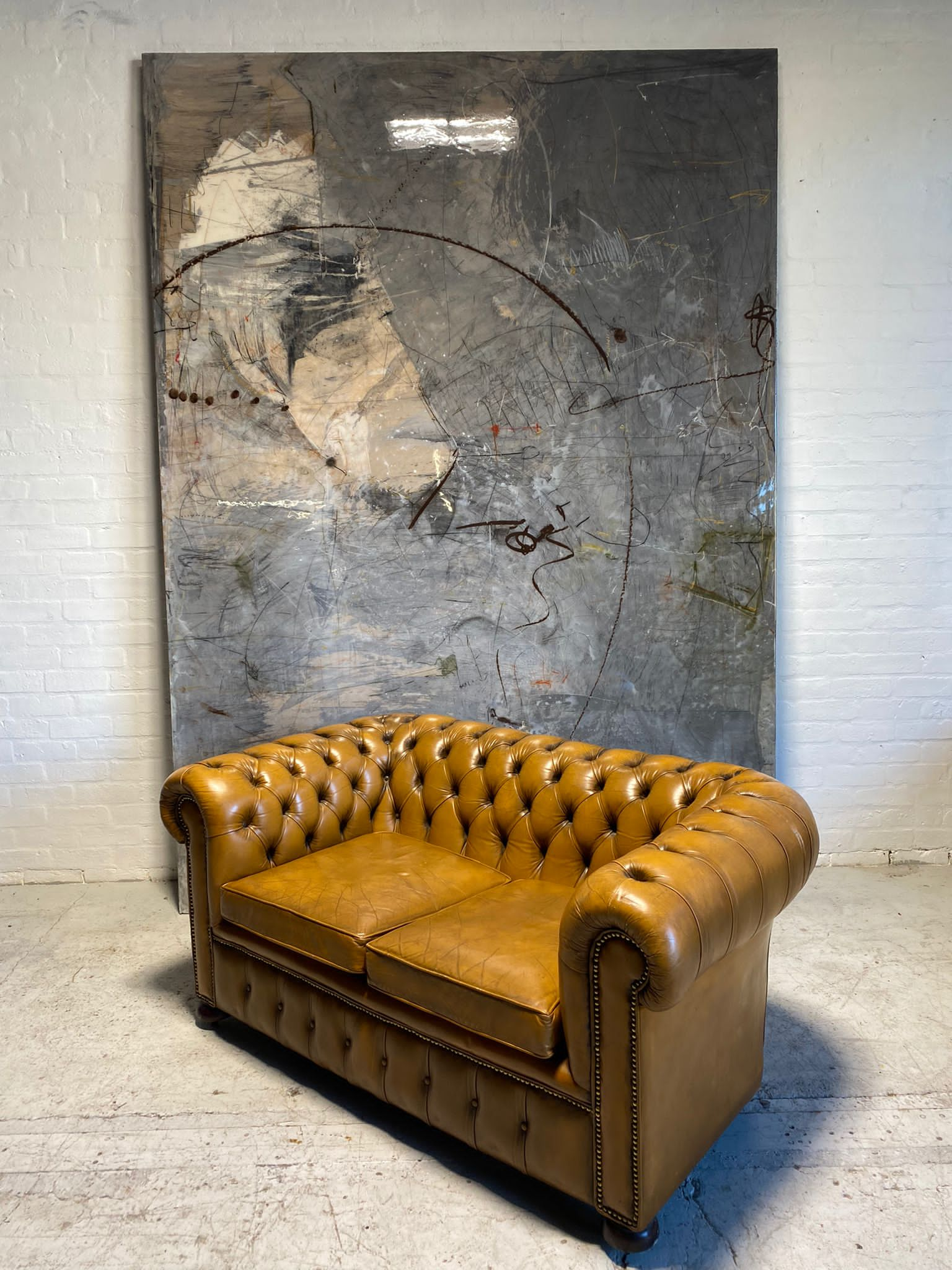 A Beautiful 2 Seater Chesterfield in Golden Tan Leather