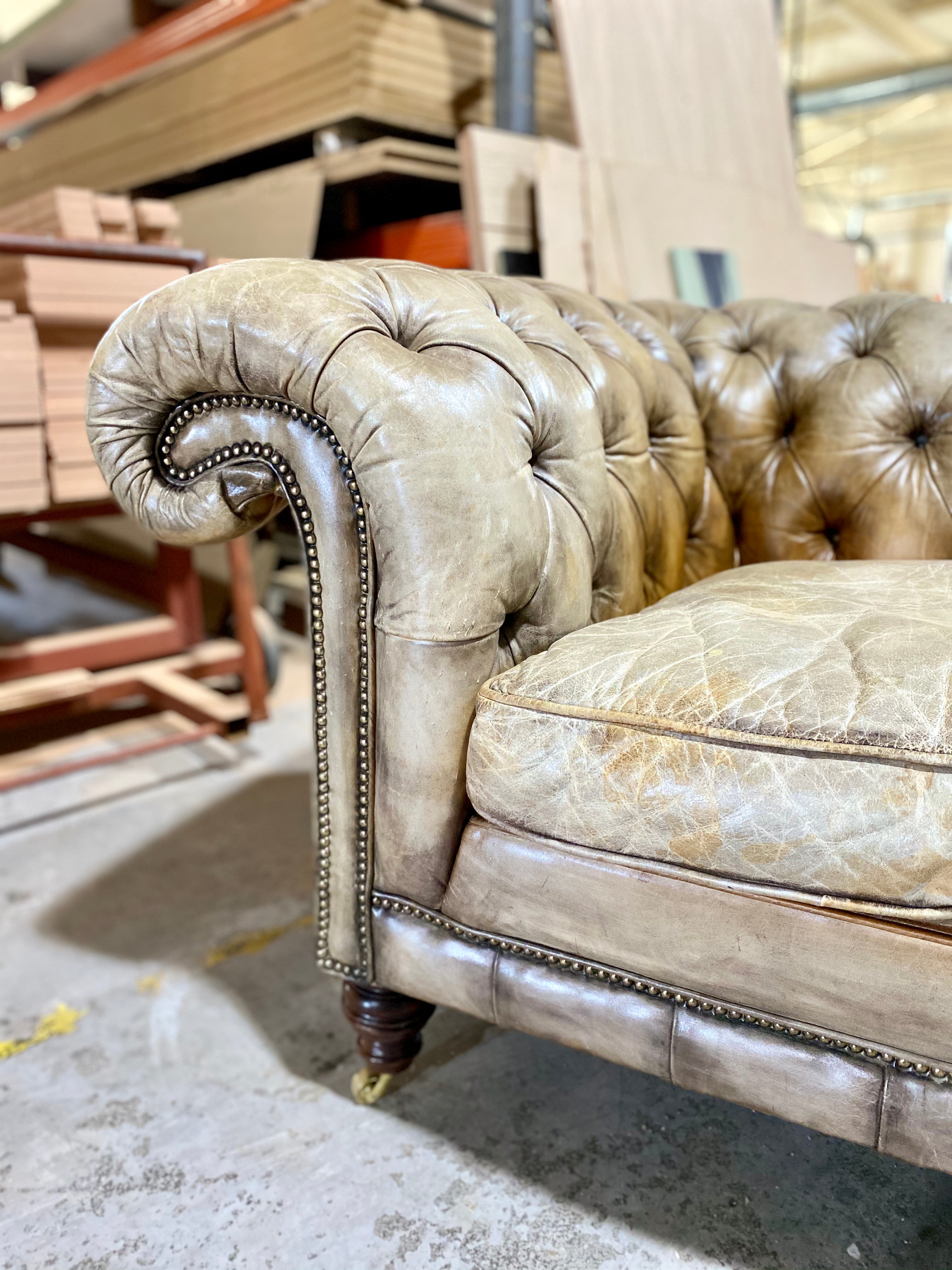 A very Smart 20thC Chesterfield Sofa in very Well Patinated Hand Dyed Leathers