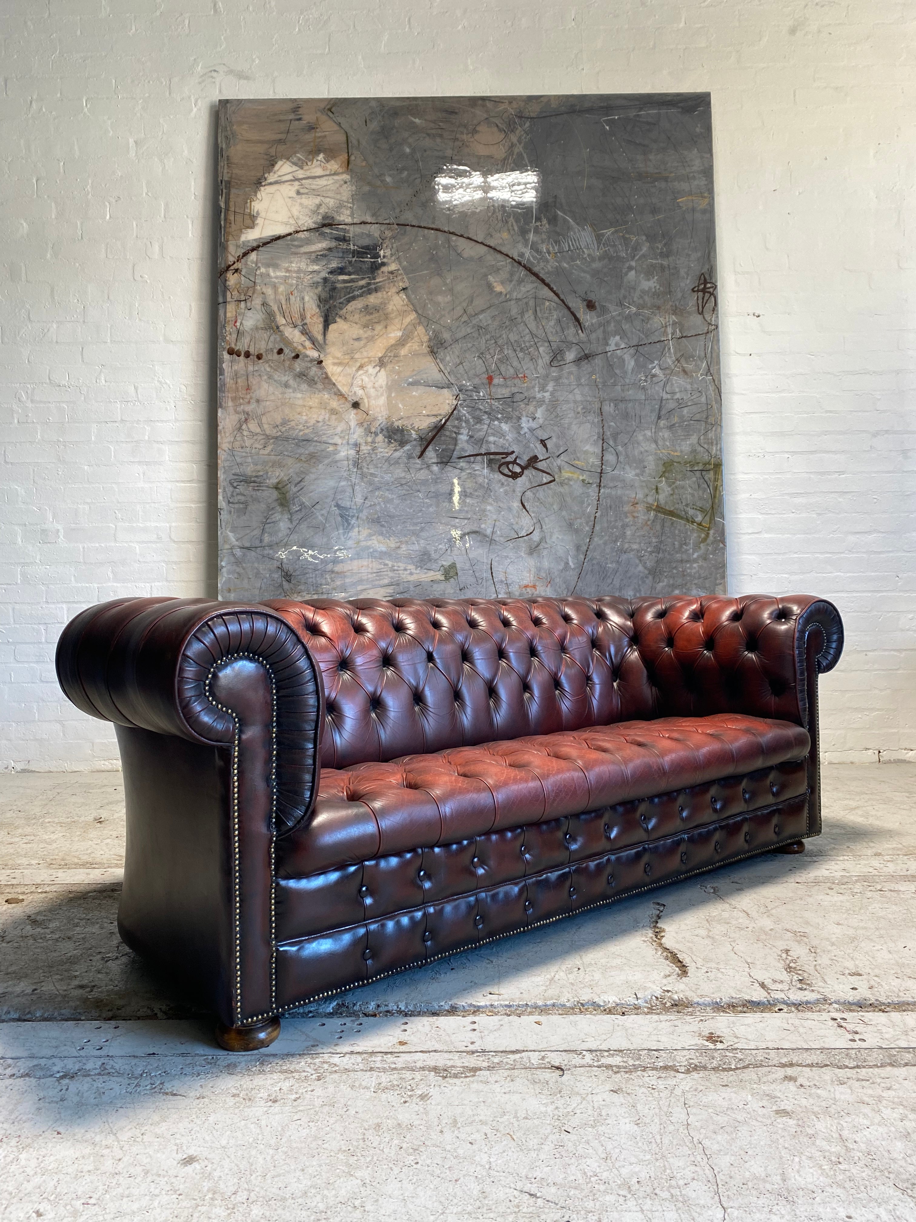 A Great Vintage MidC Chesterfield with Matching Club Chair