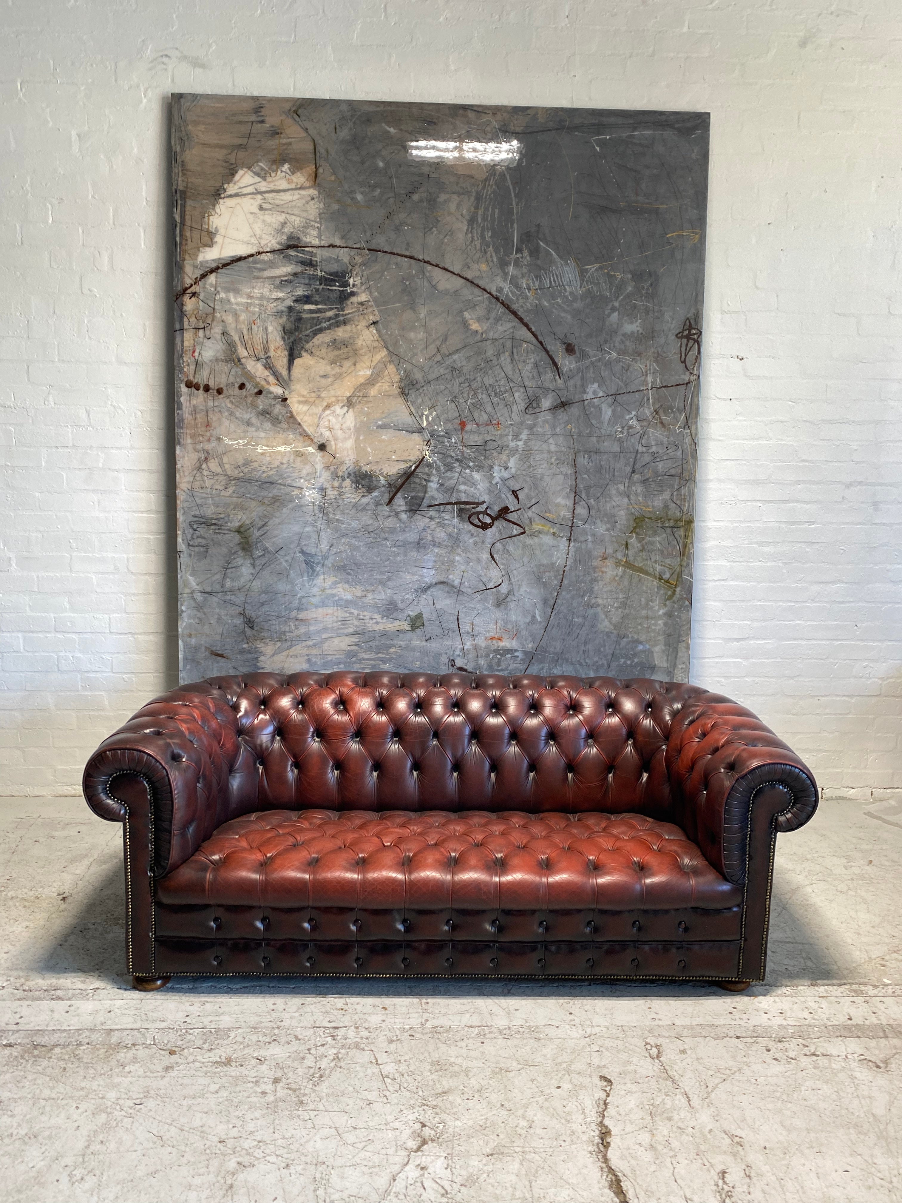 A Great Vintage MidC Chesterfield with Matching Club Chair