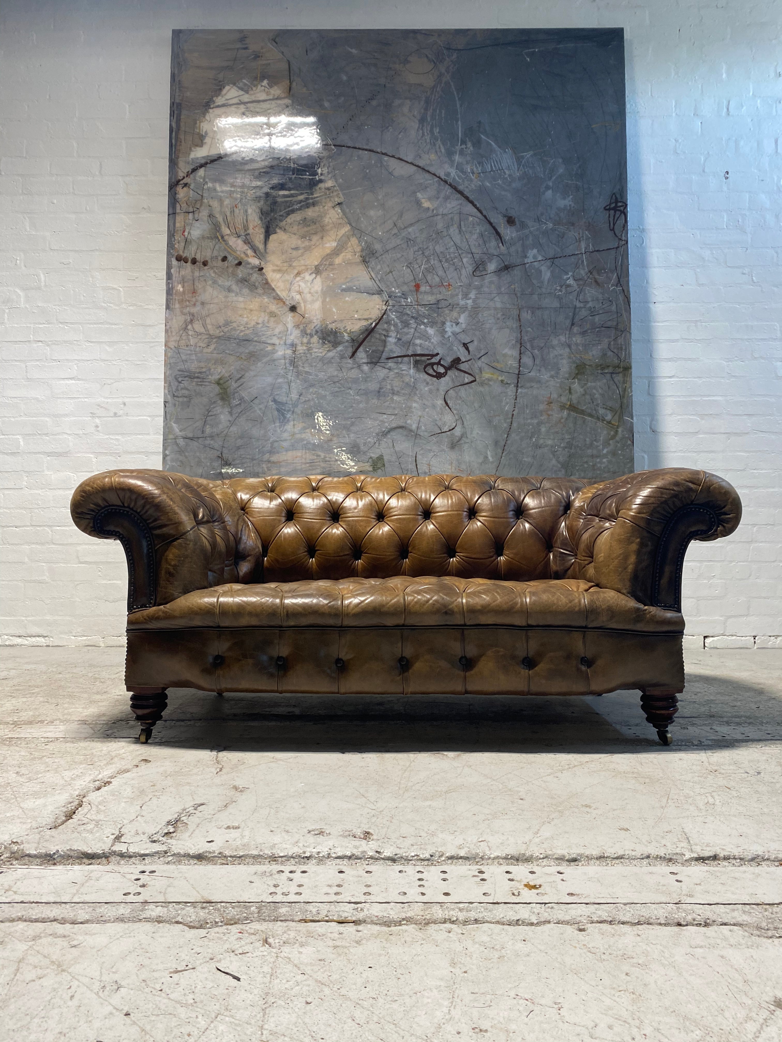 A Very Special and Rare Howard & Sons 19thC Chesterfield Sofa in Original Leathers