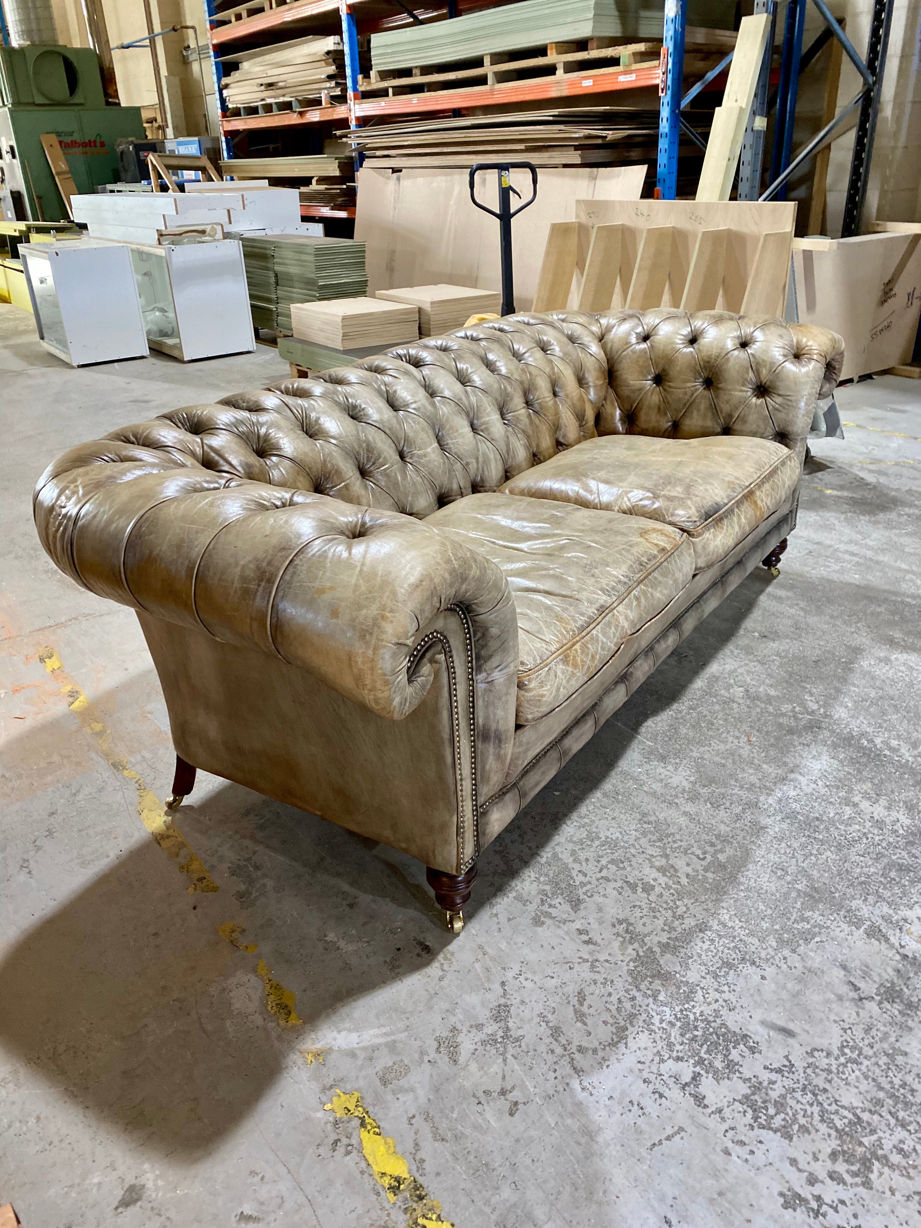 A very Smart 20thC Chesterfield Sofa in very Well Patinated Hand Dyed Leathers