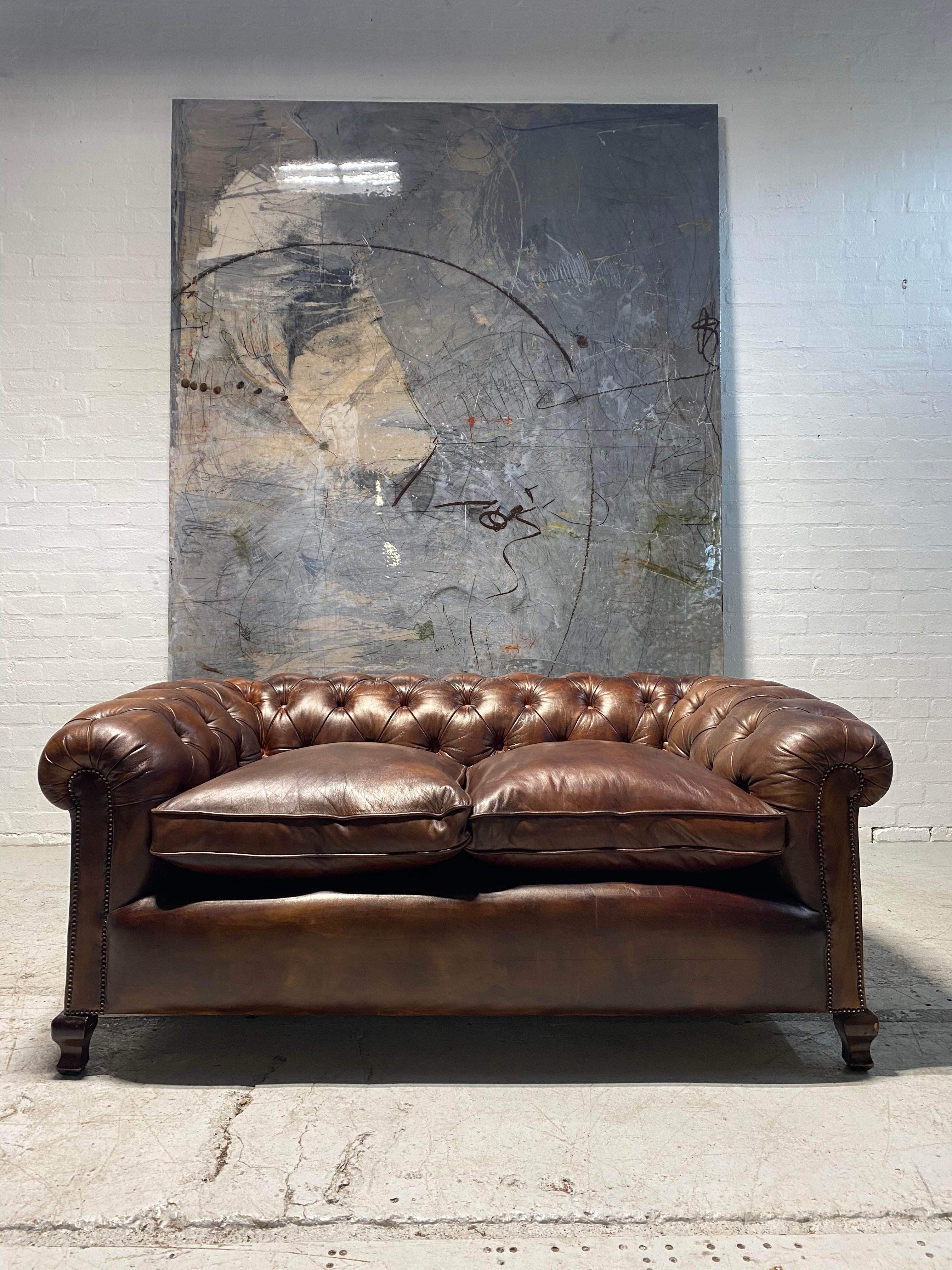 A Beautiful Restored Antique Sofa in Hand Dyed Leathers Circa 1900