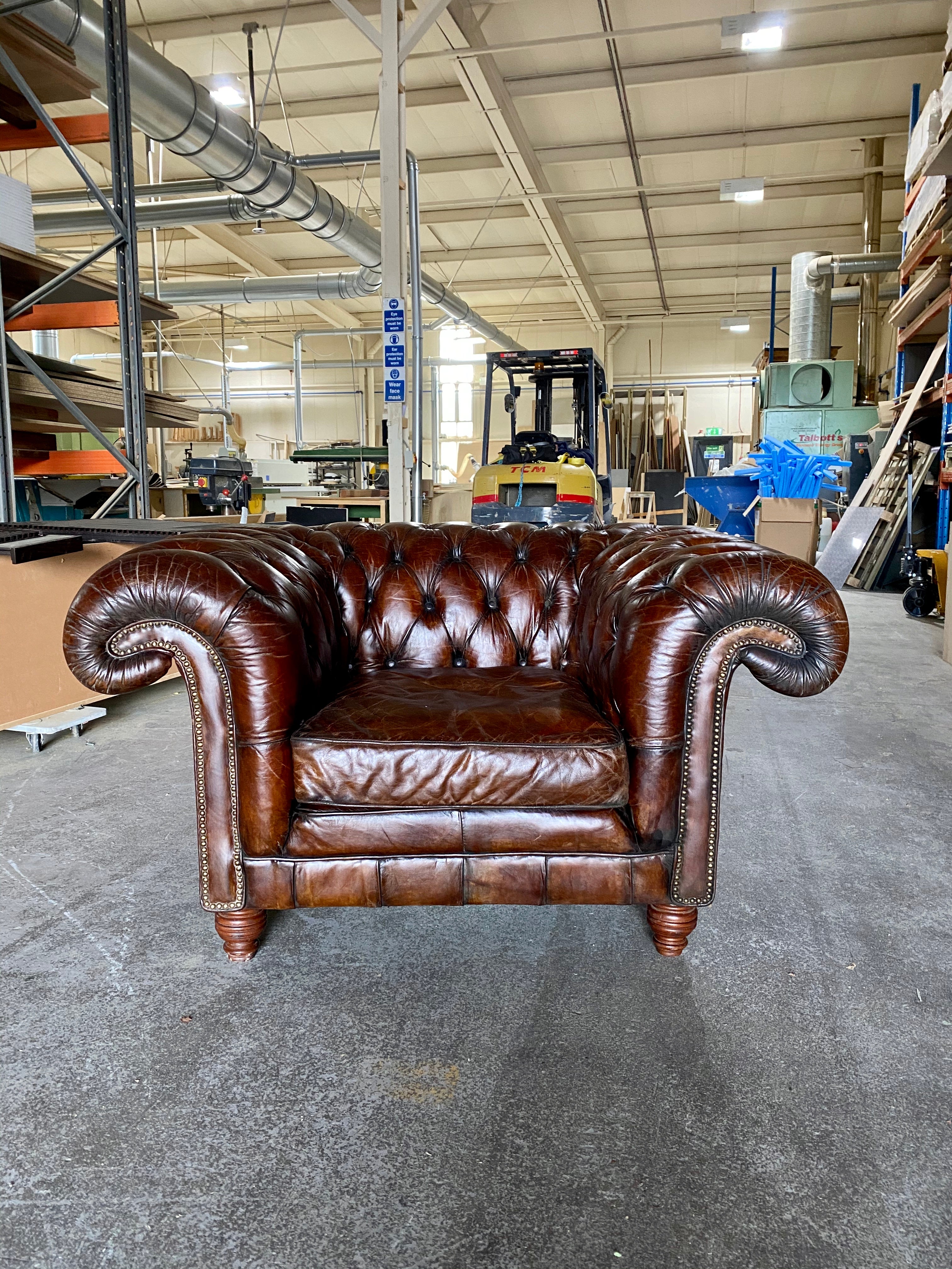 An Exceptionally Large Gentleman’s Club Chair in Hand Dyed Dark Walnut