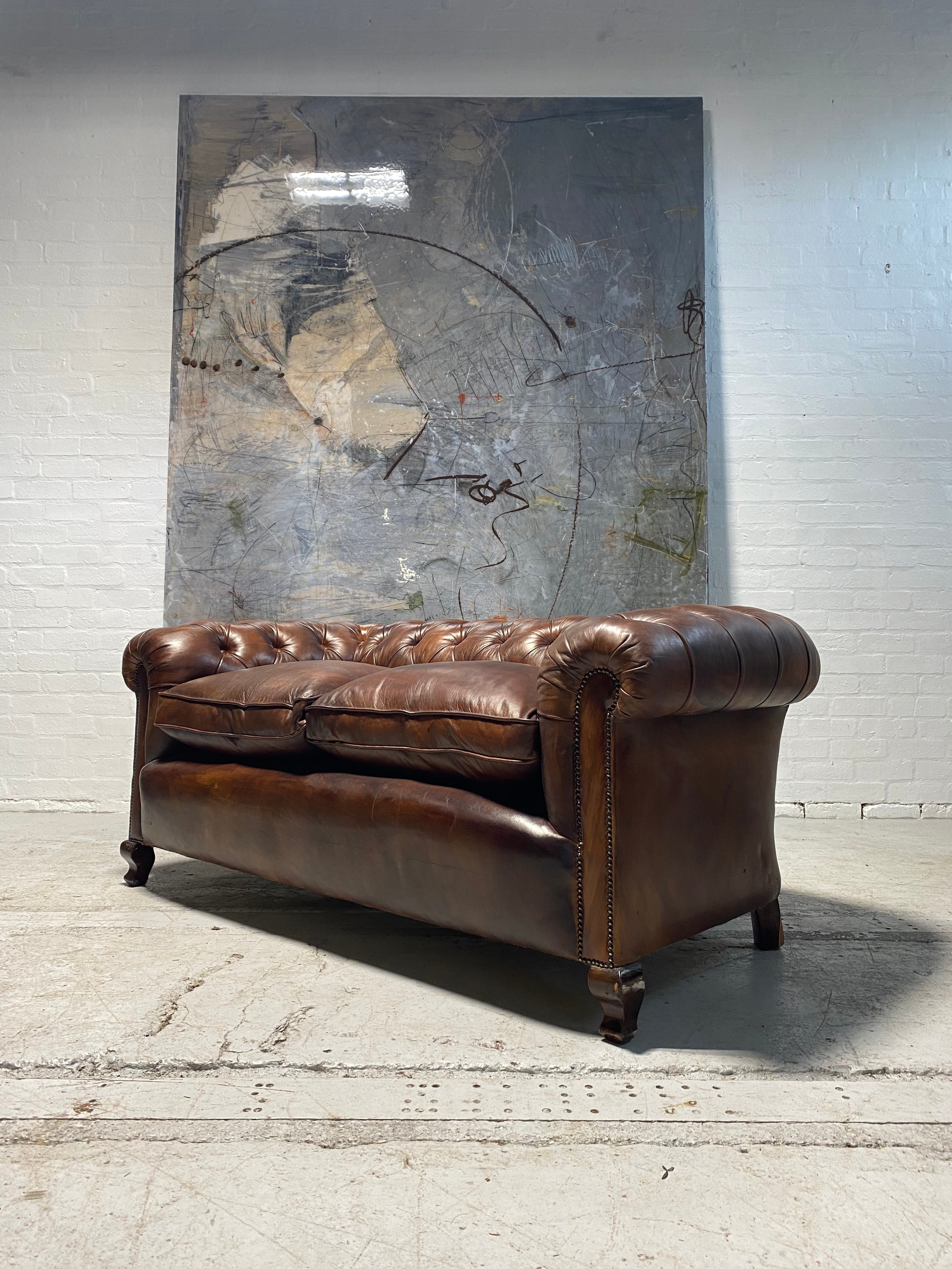 A Beautiful Restored Antique Sofa in Hand Dyed Leathers Circa 1900