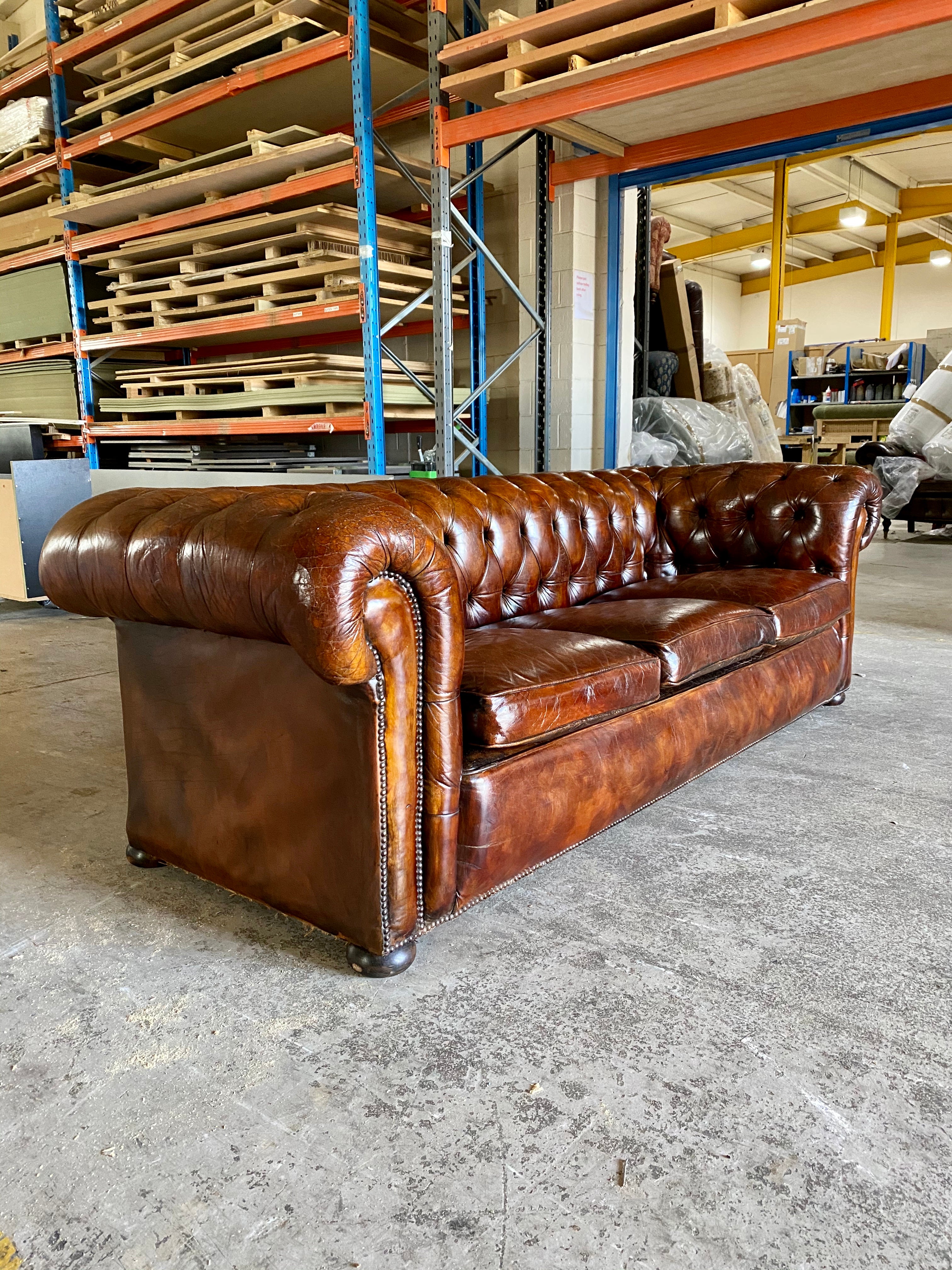 A Very Smart MidC Hand Dyed Leather Chesterfield Sofa in Conker