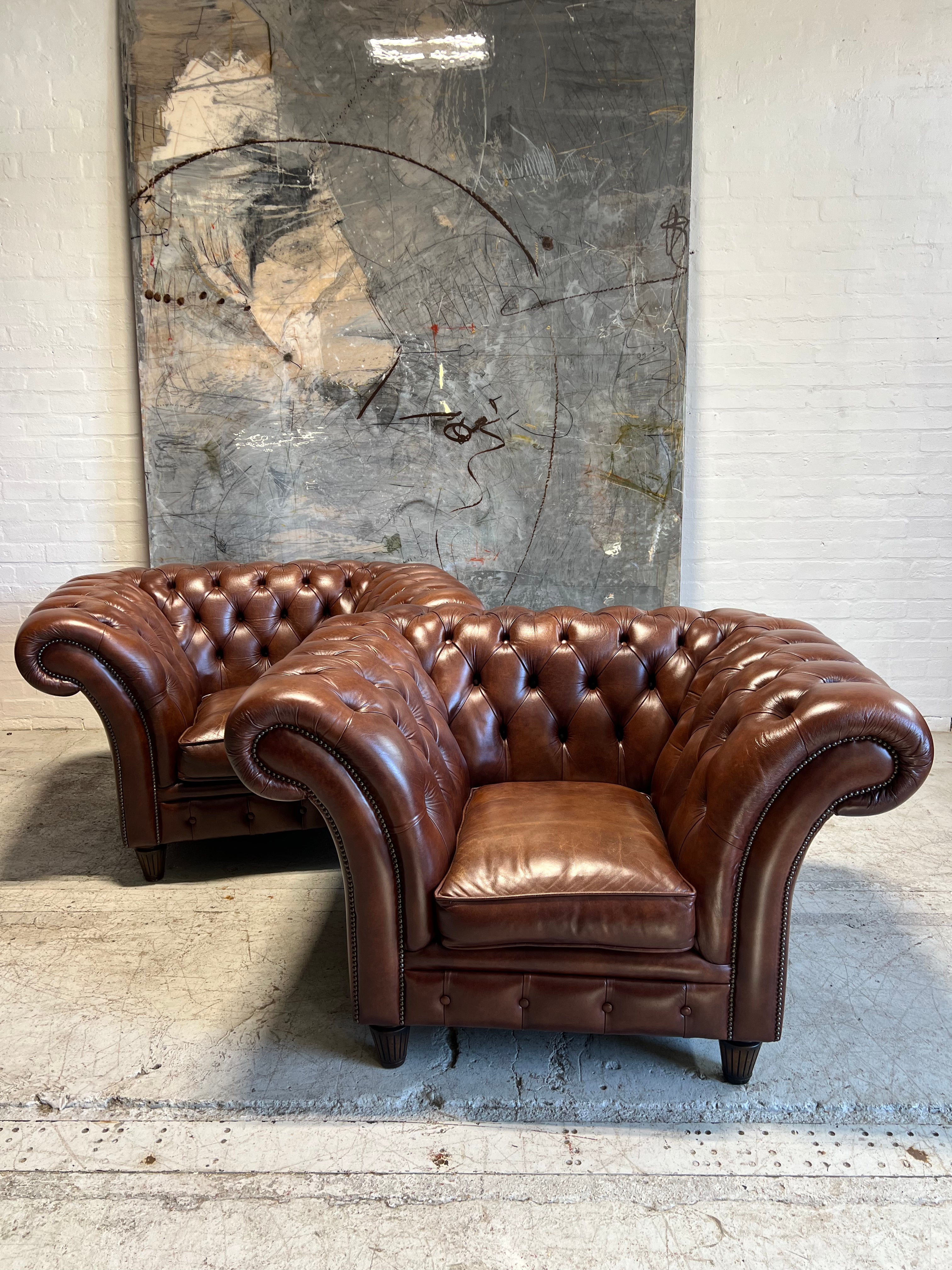 A Super Smart Matching Pair of Large Leather Chesterfield Club Chairs