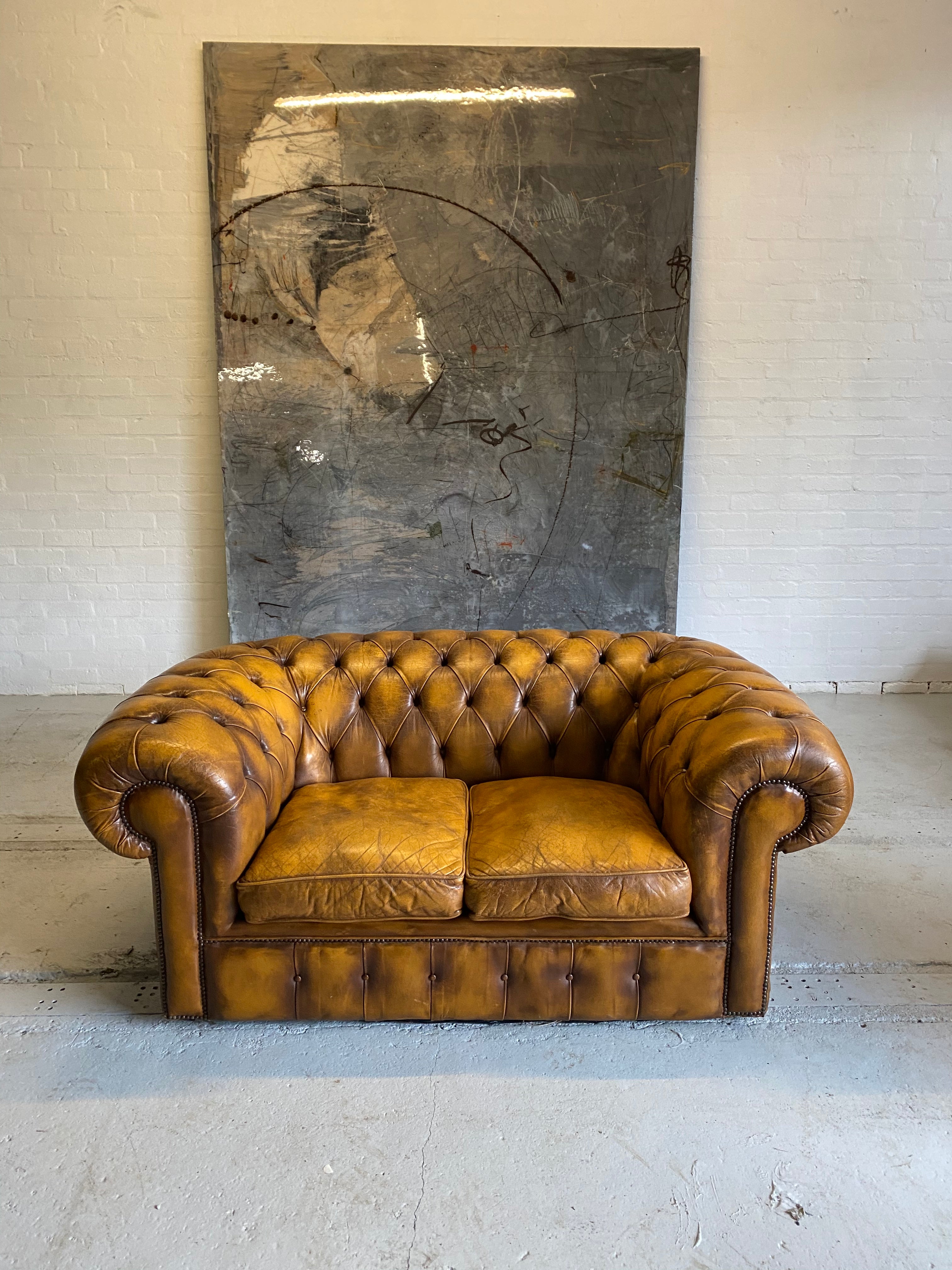 An Amazing Autumn Tan 2 seat Chesterfield Sofa