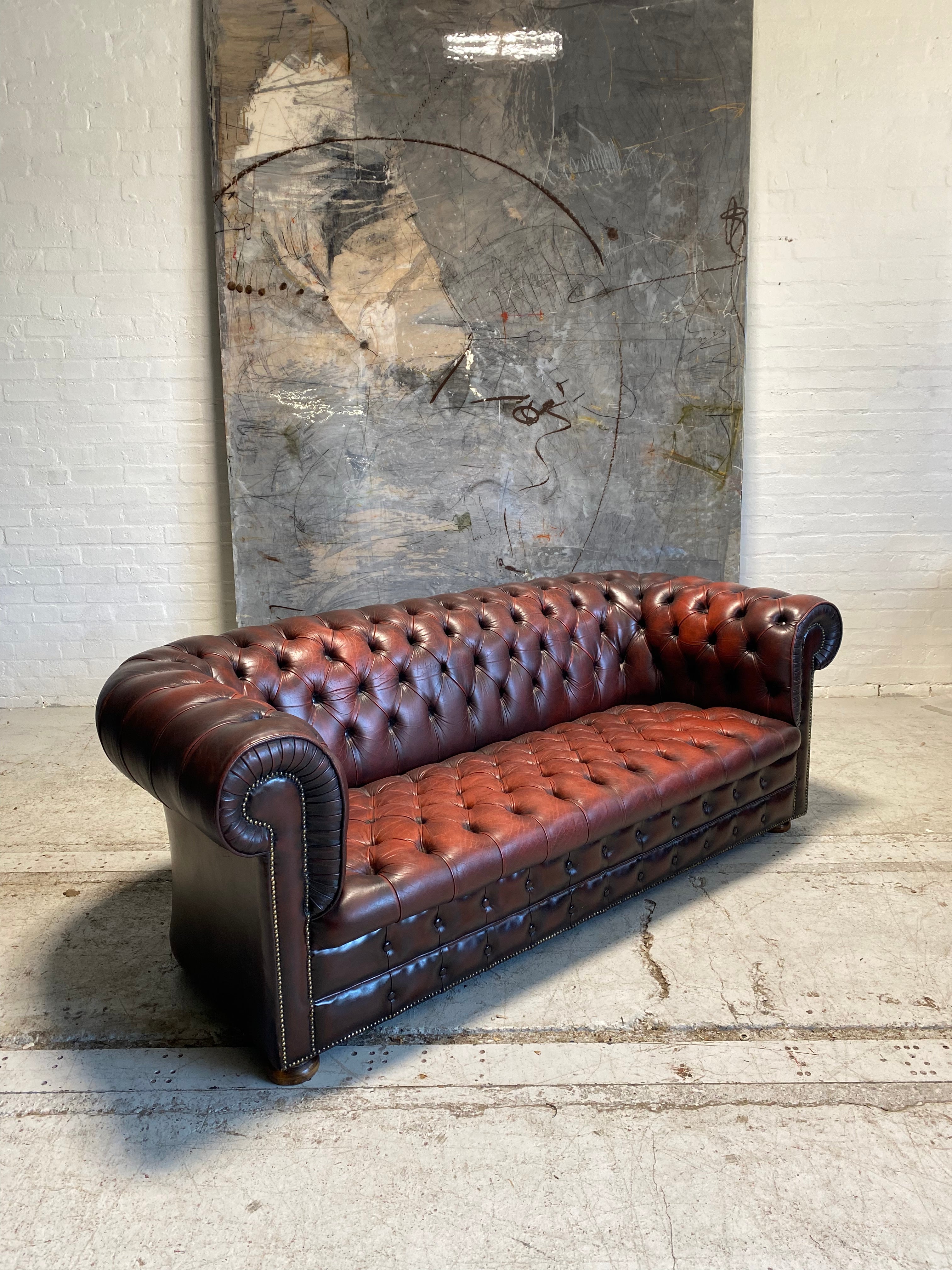 A Great Vintage MidC Chesterfield with Matching Club Chair