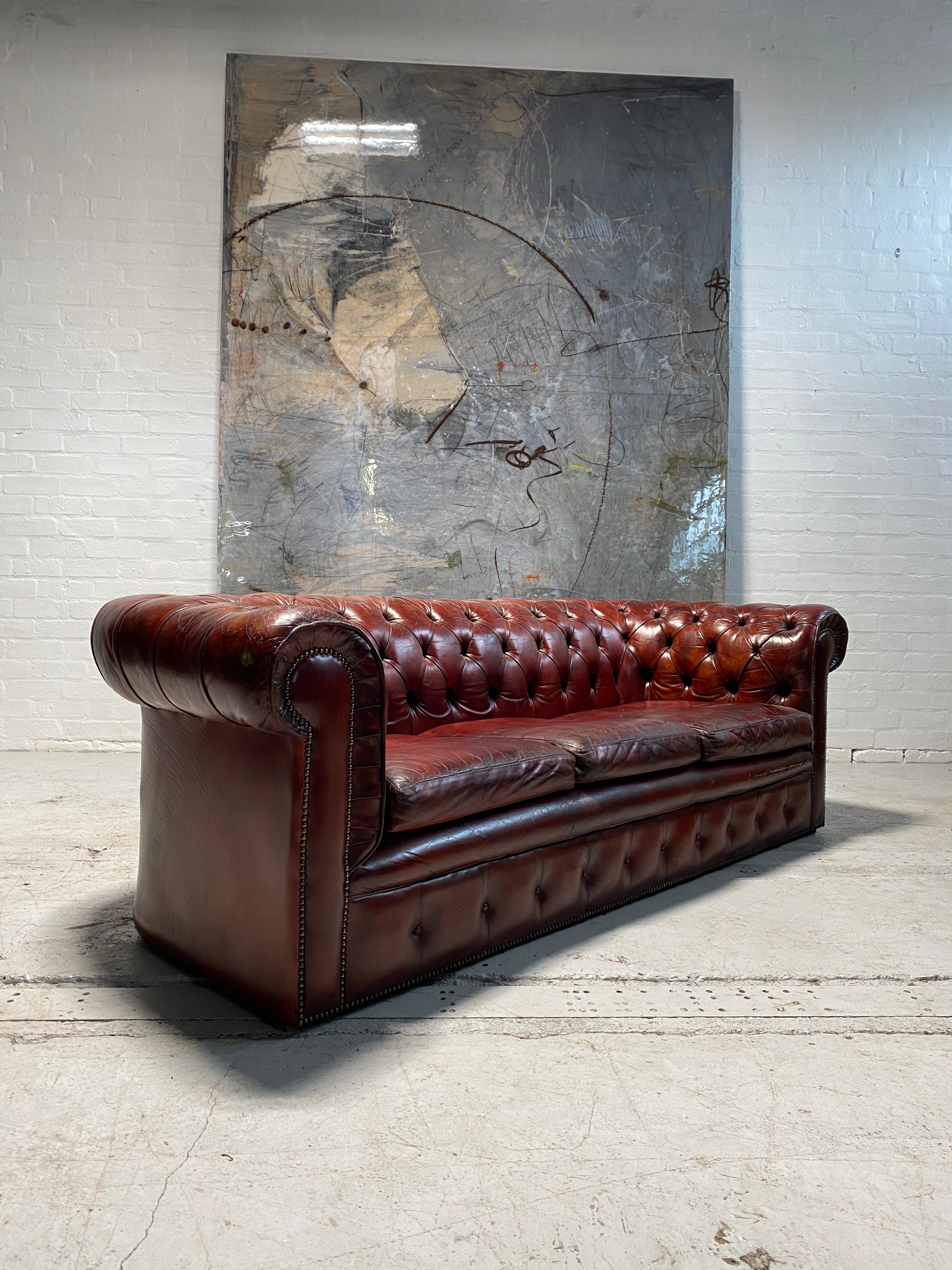 A Stunning MidC Vintage Chesterfield Sofa